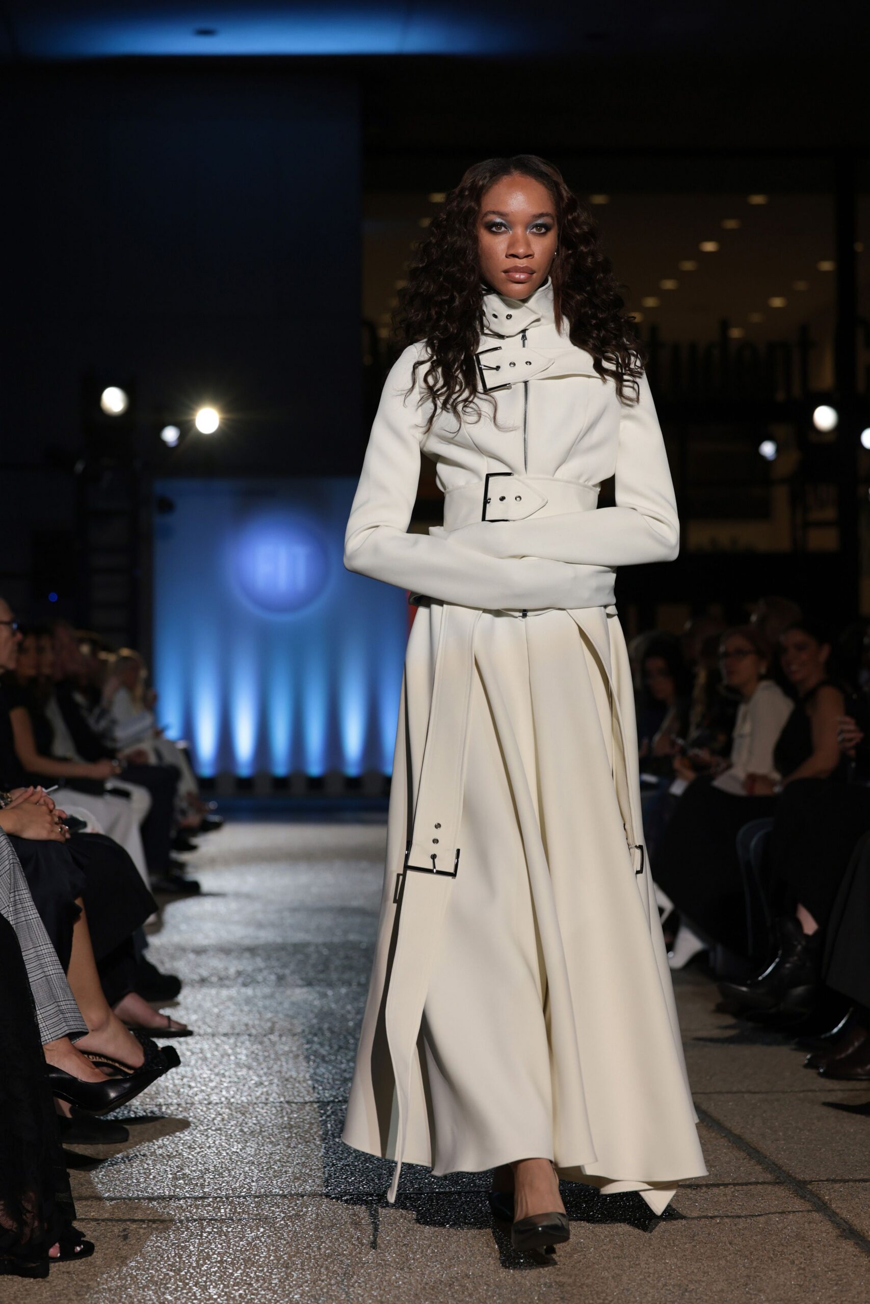 white leather long-sleeve collared fitted zippered belted coat