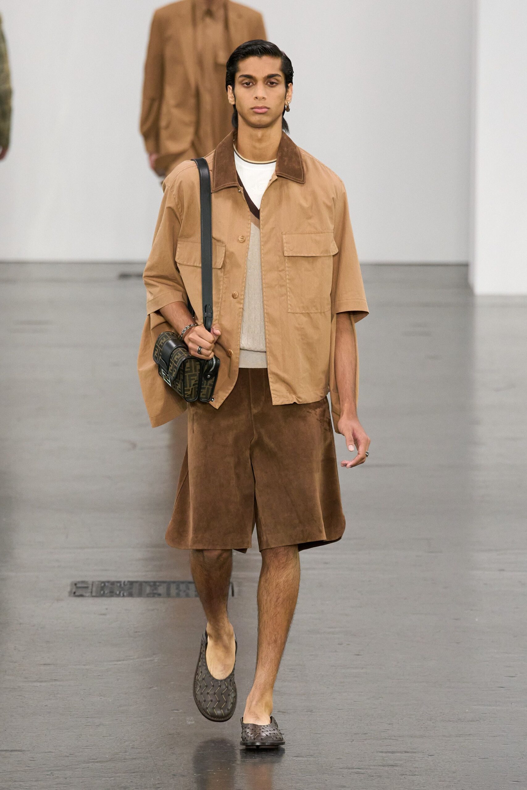 beige shirt brown shorts