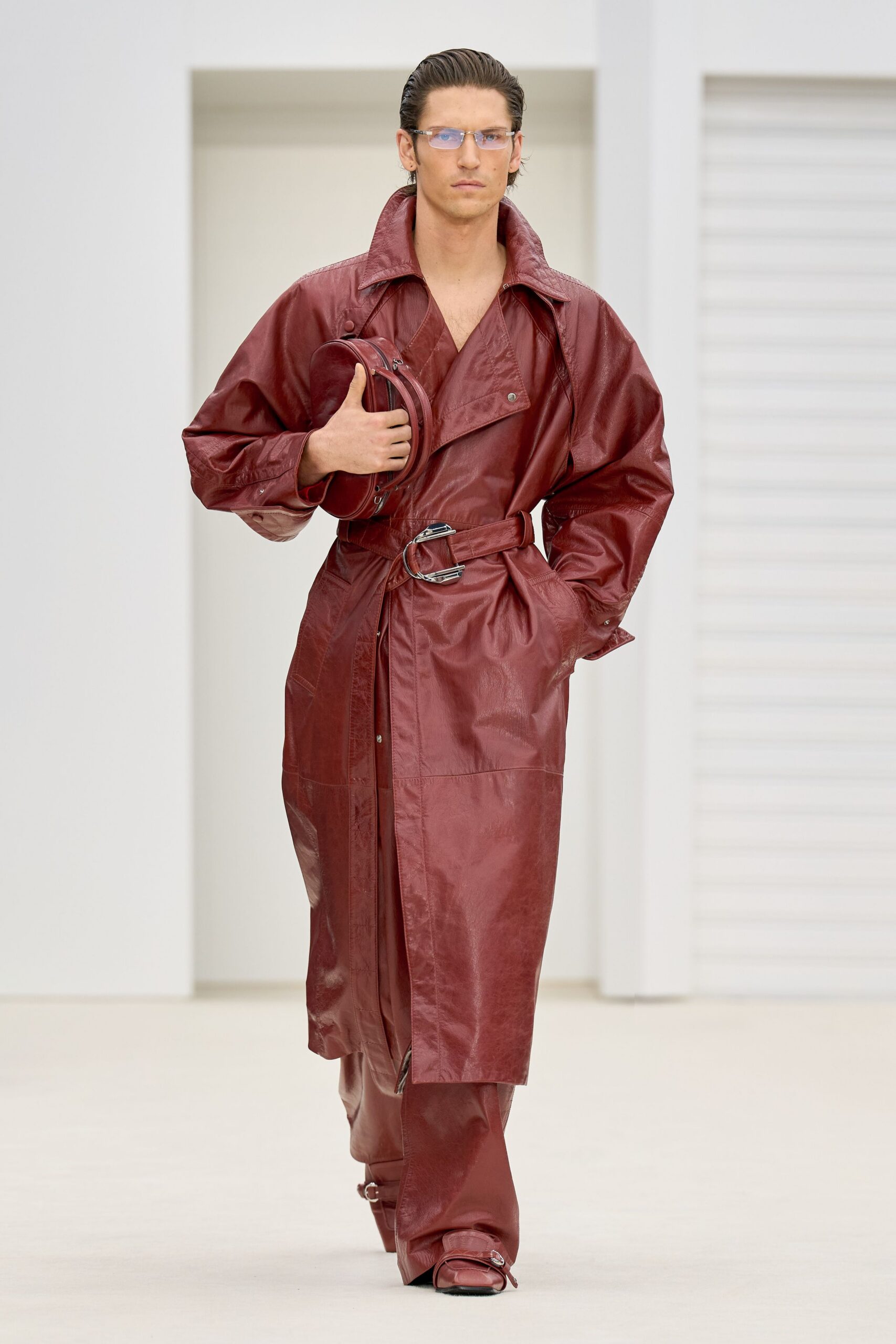 red leather long-sleeve collared relaxed belted trench