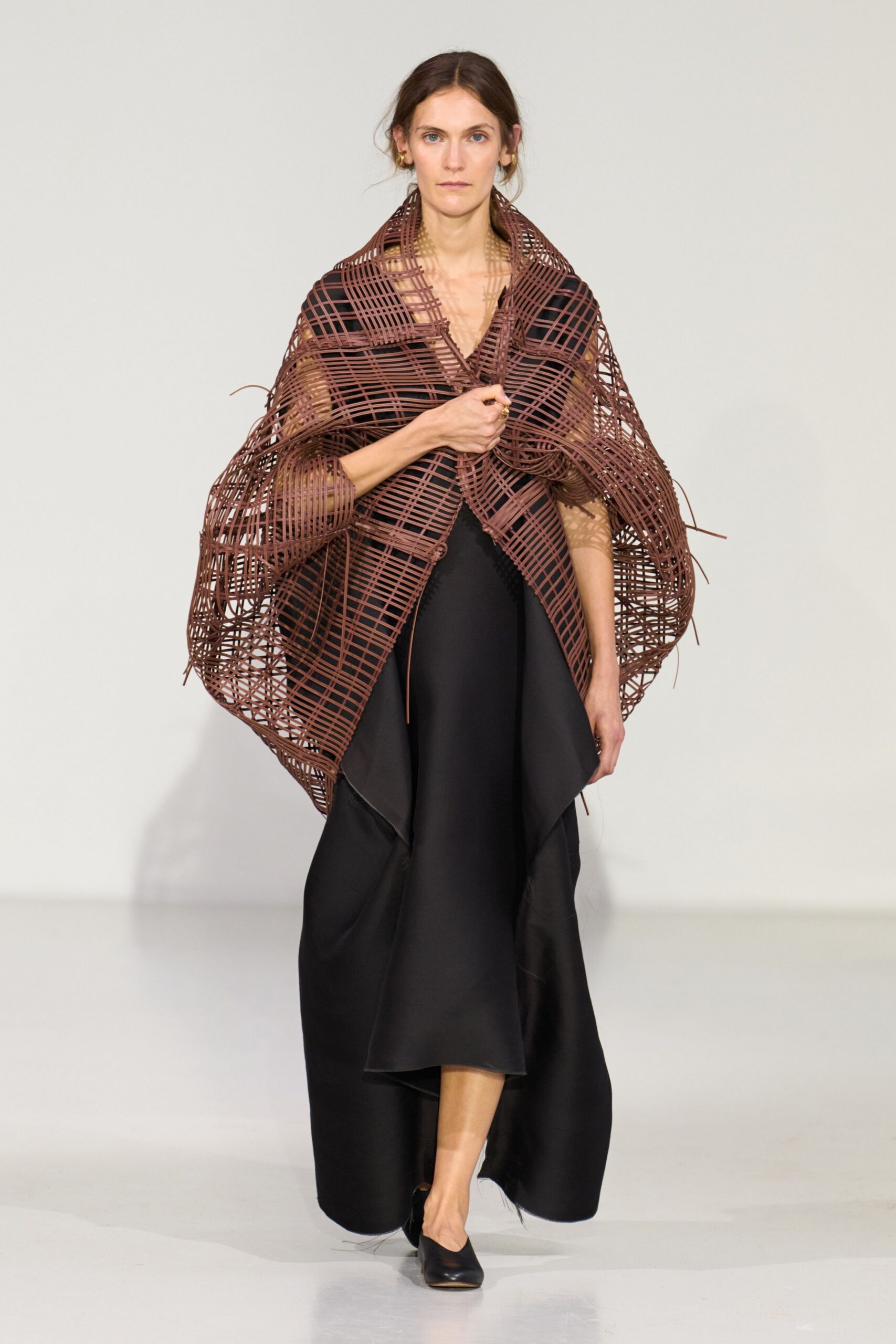 black silk fitted gown with brown cape