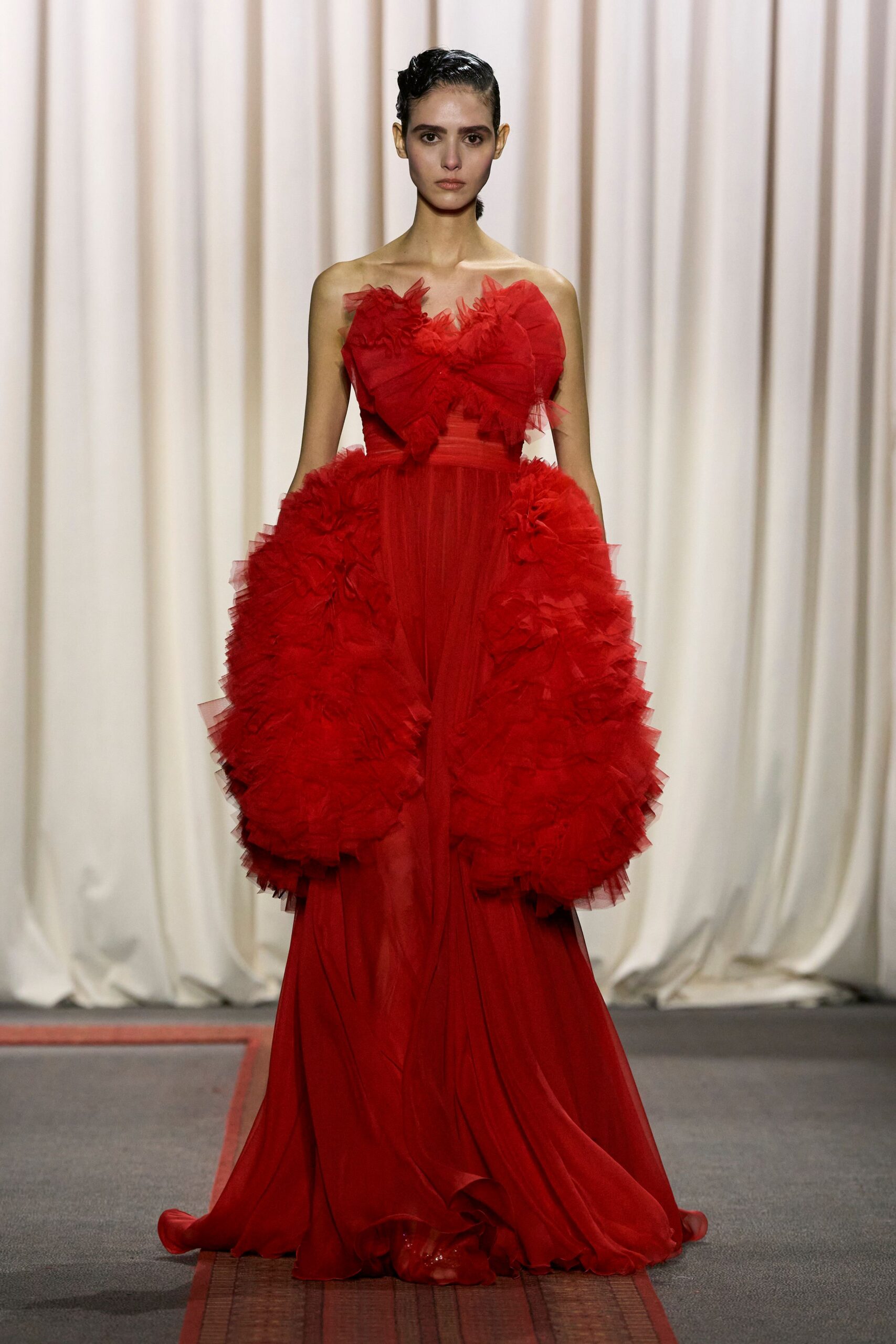 red ruffled sleeveless gown