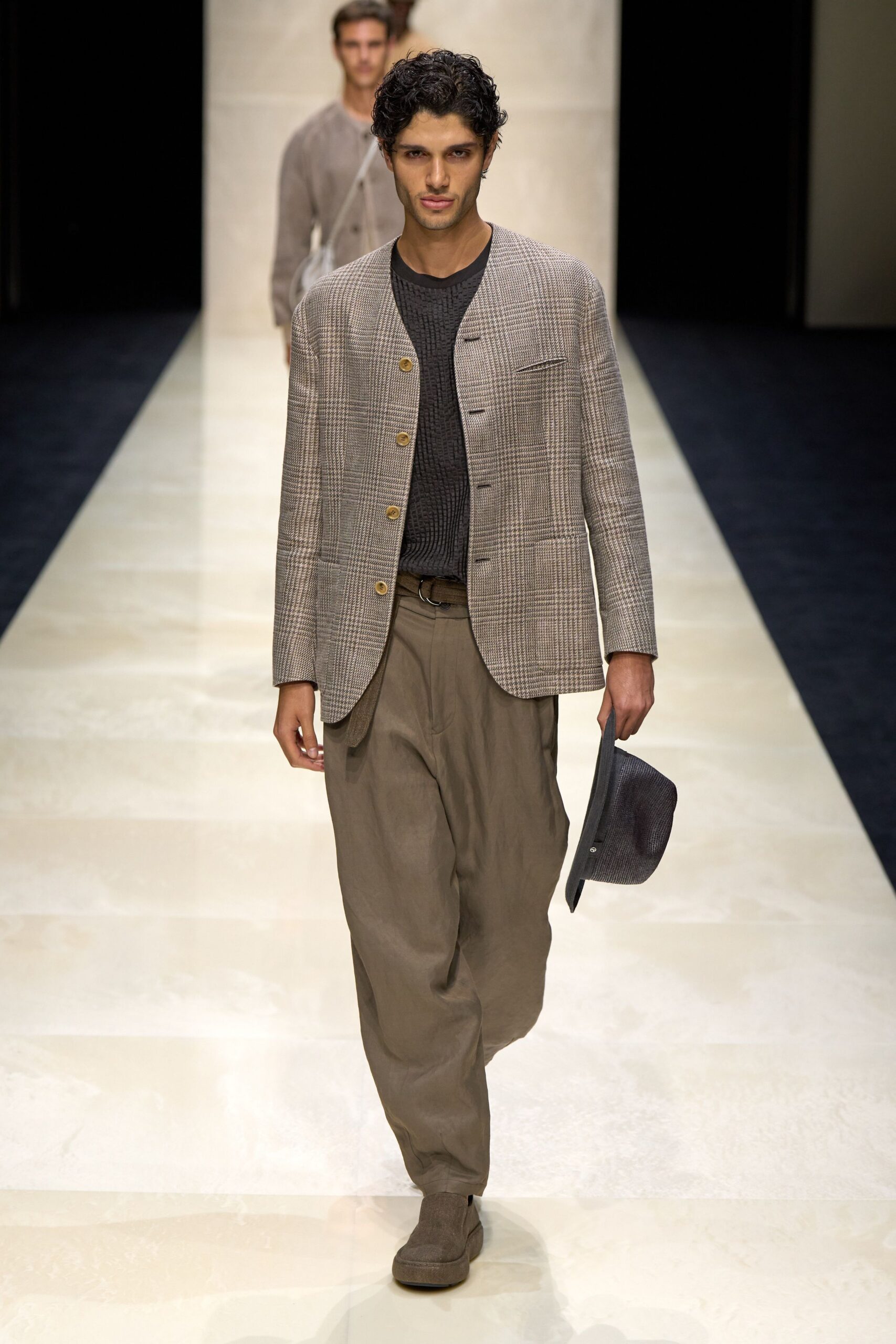 gray checked blazer with beige pants