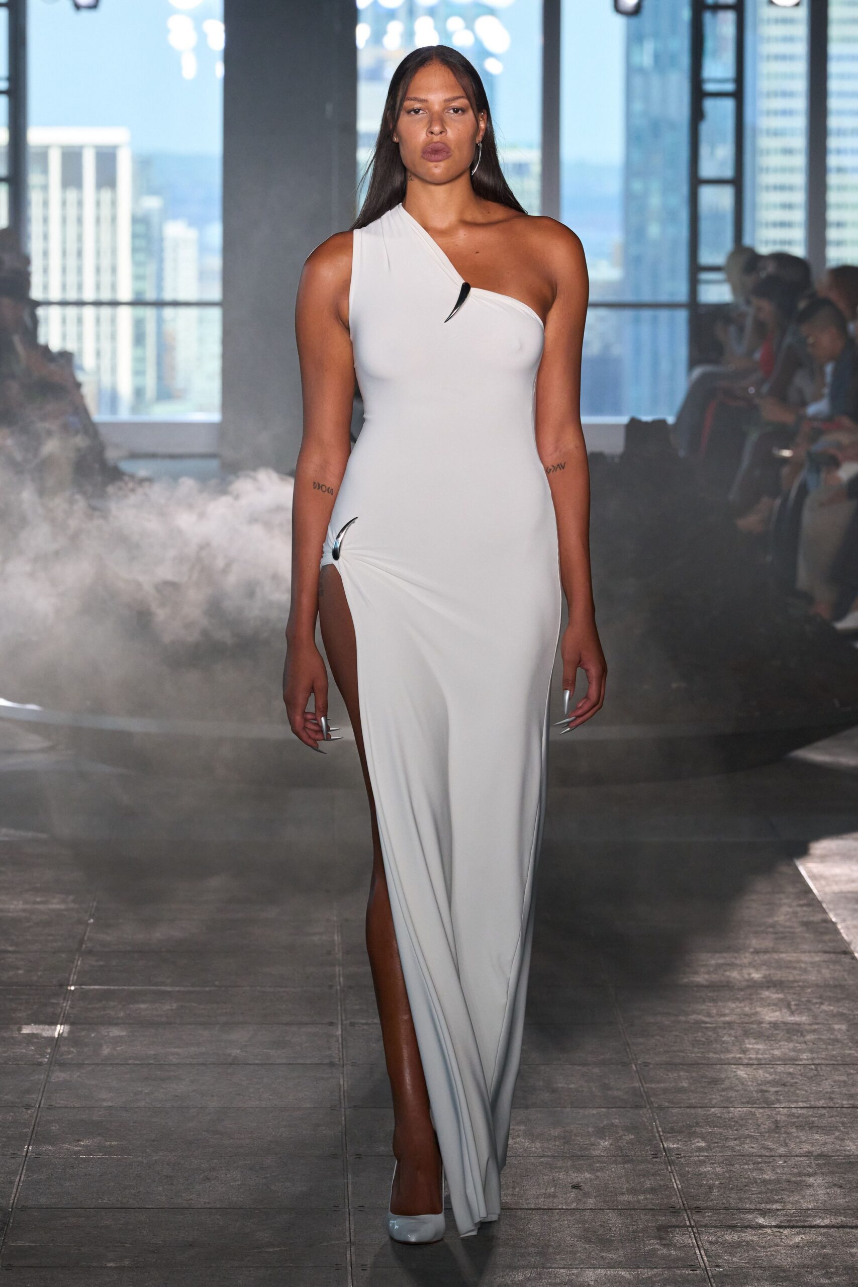 white silk sleeveless high-neck fitted flowing maxi gown