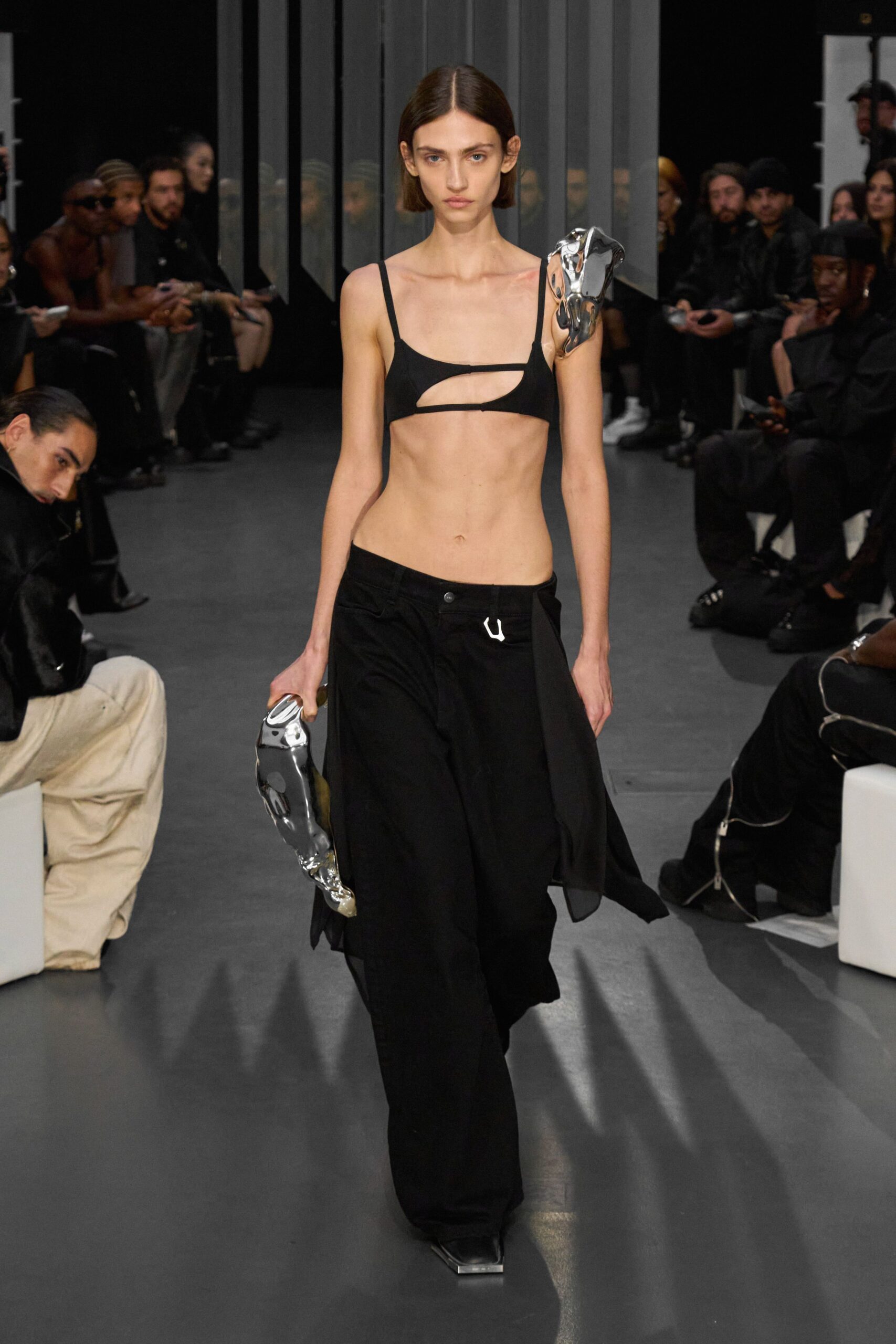 black fitted top with cutouts