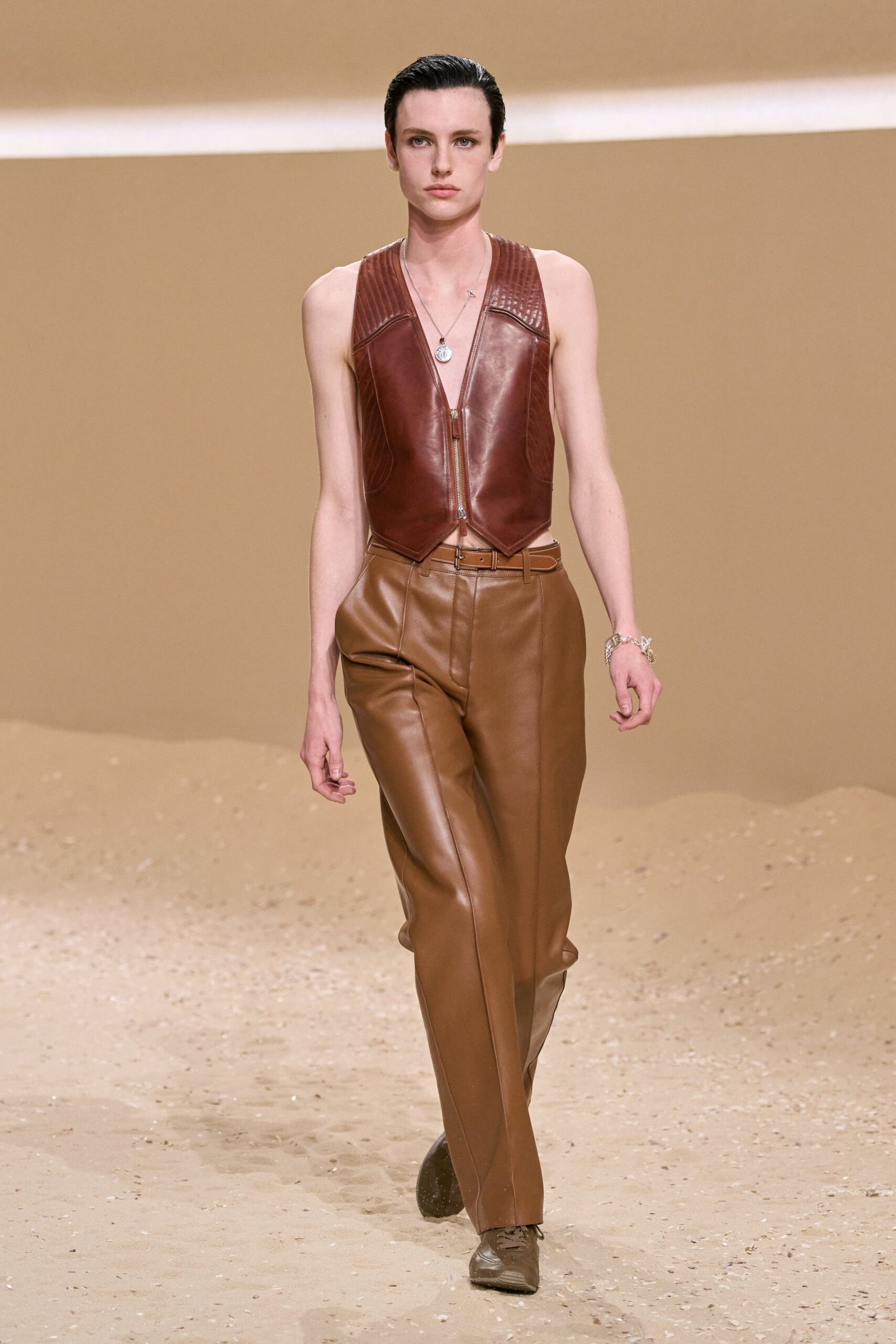 brown leather vest and pants