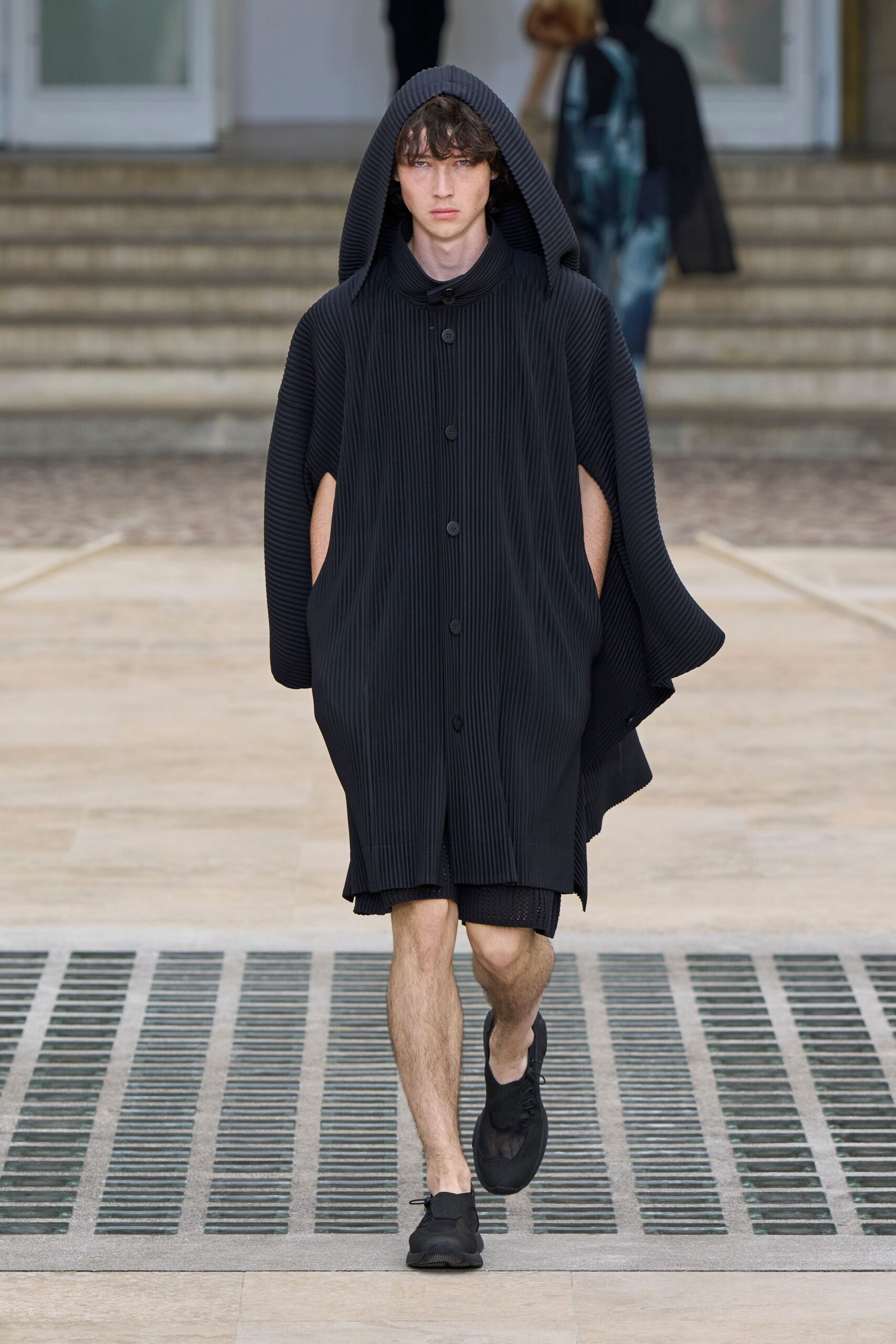 black pleated cape with shorts
