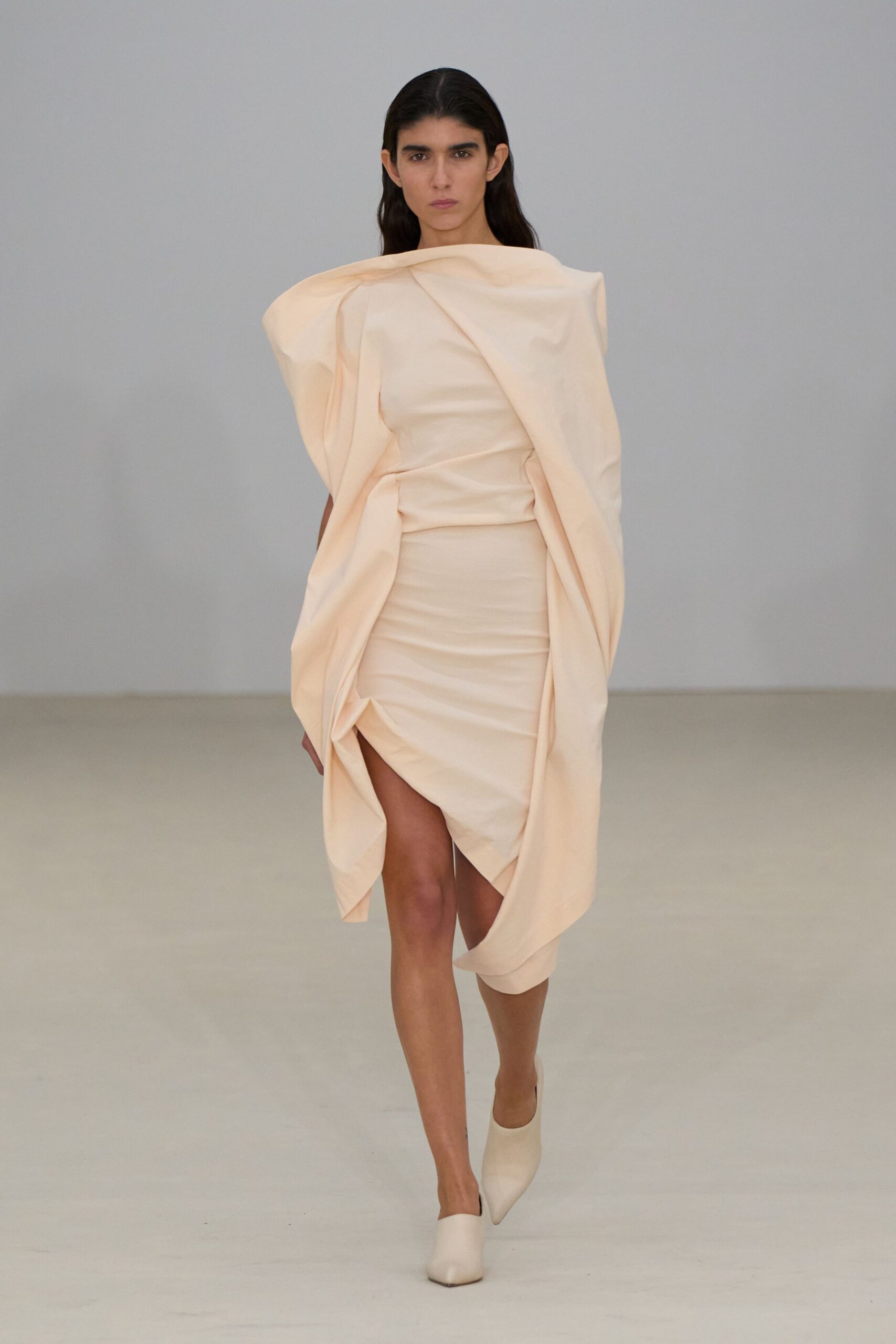 beige silk sleeveless v-neck fitted draped flowing dress