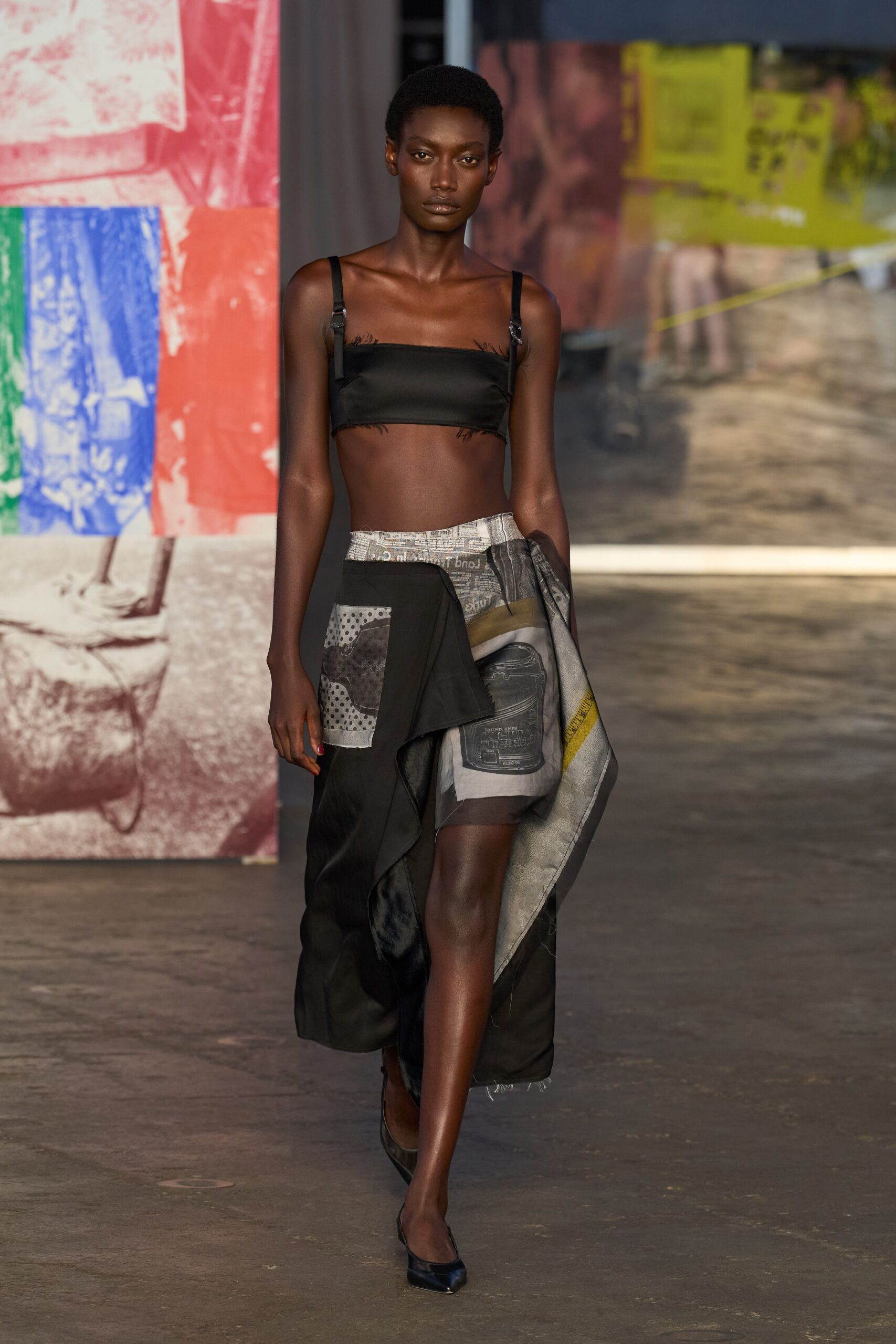 black crop-top and asymmetric skirt