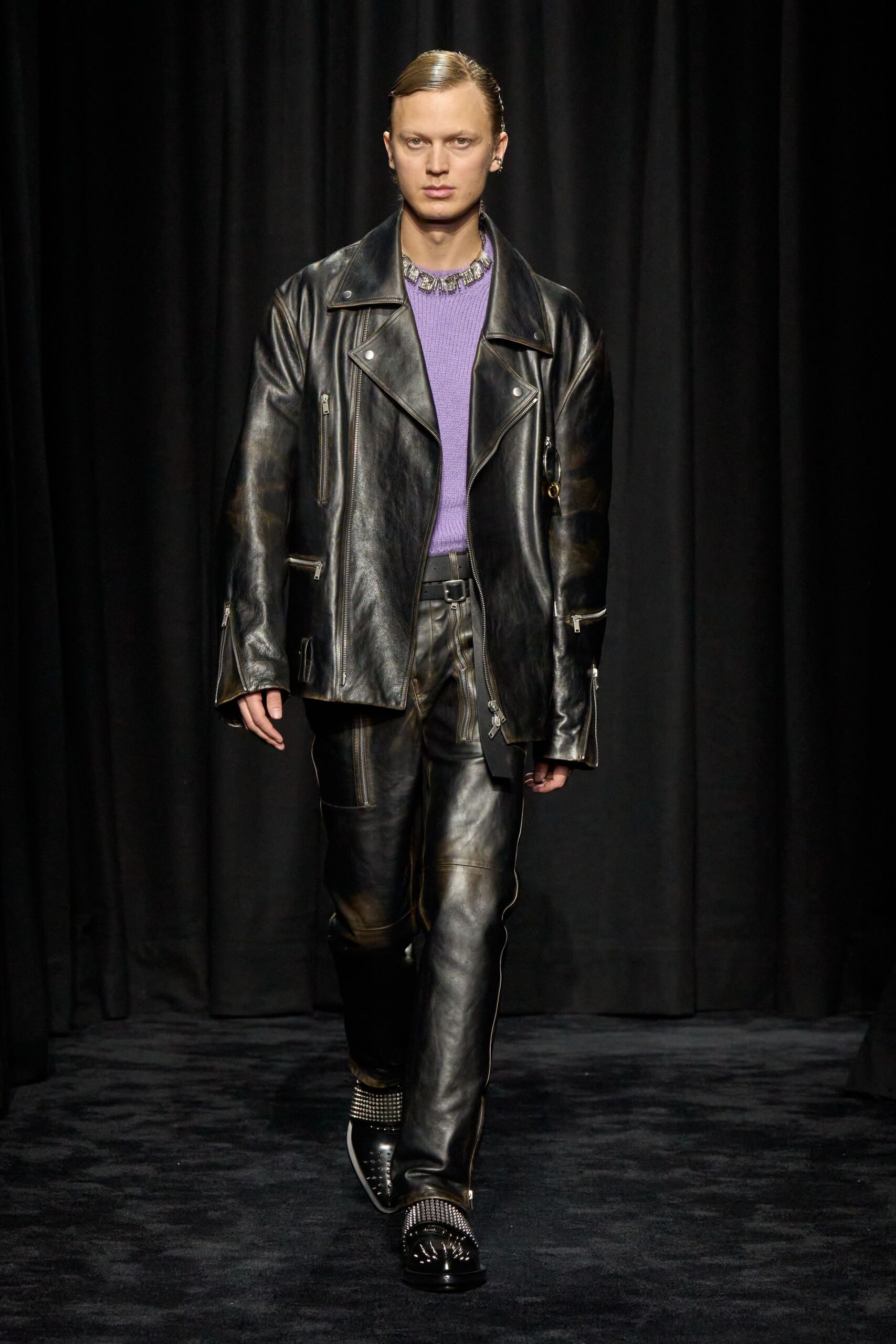 black leather jacket with purple top