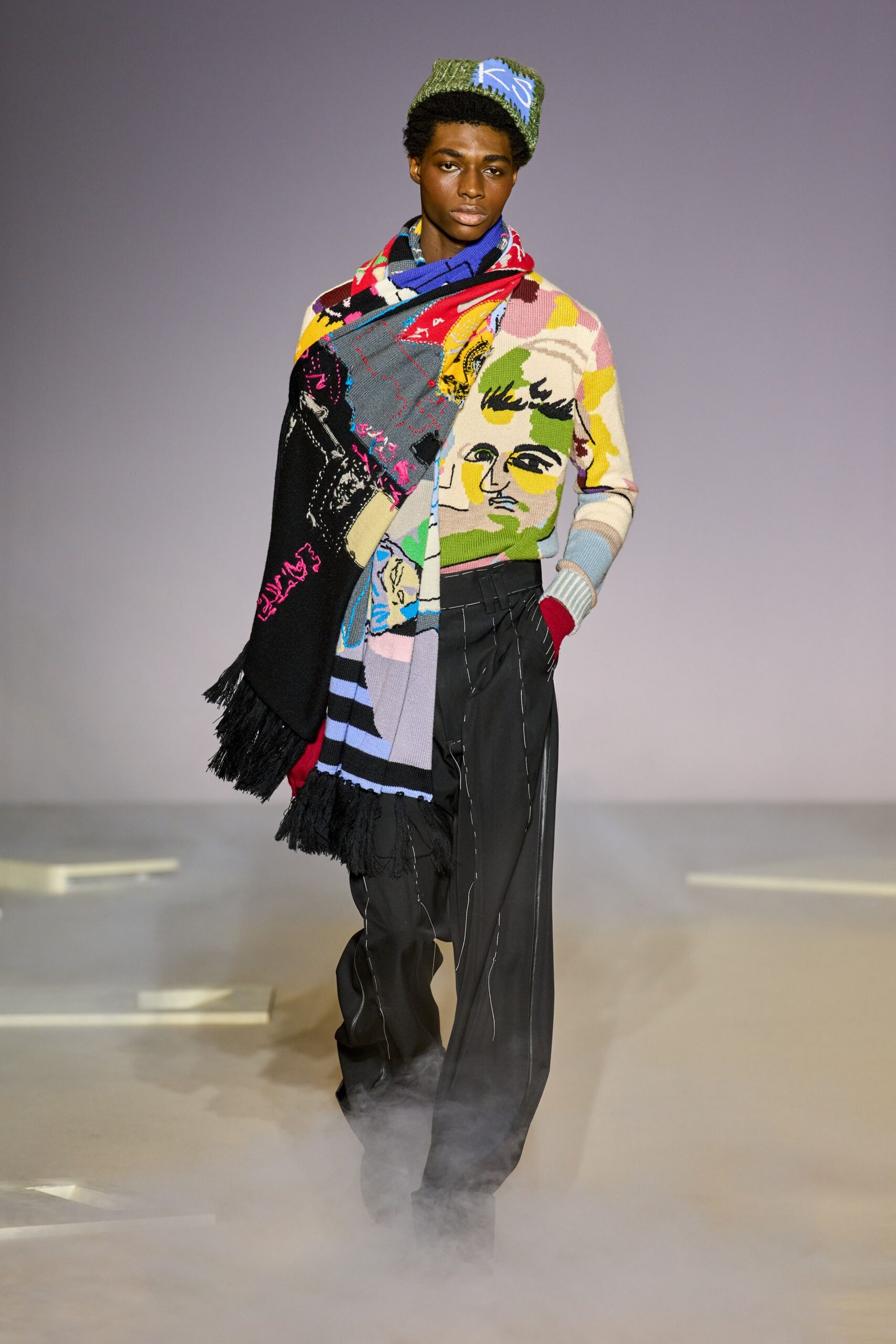 multi-colored sweater with tailored pants