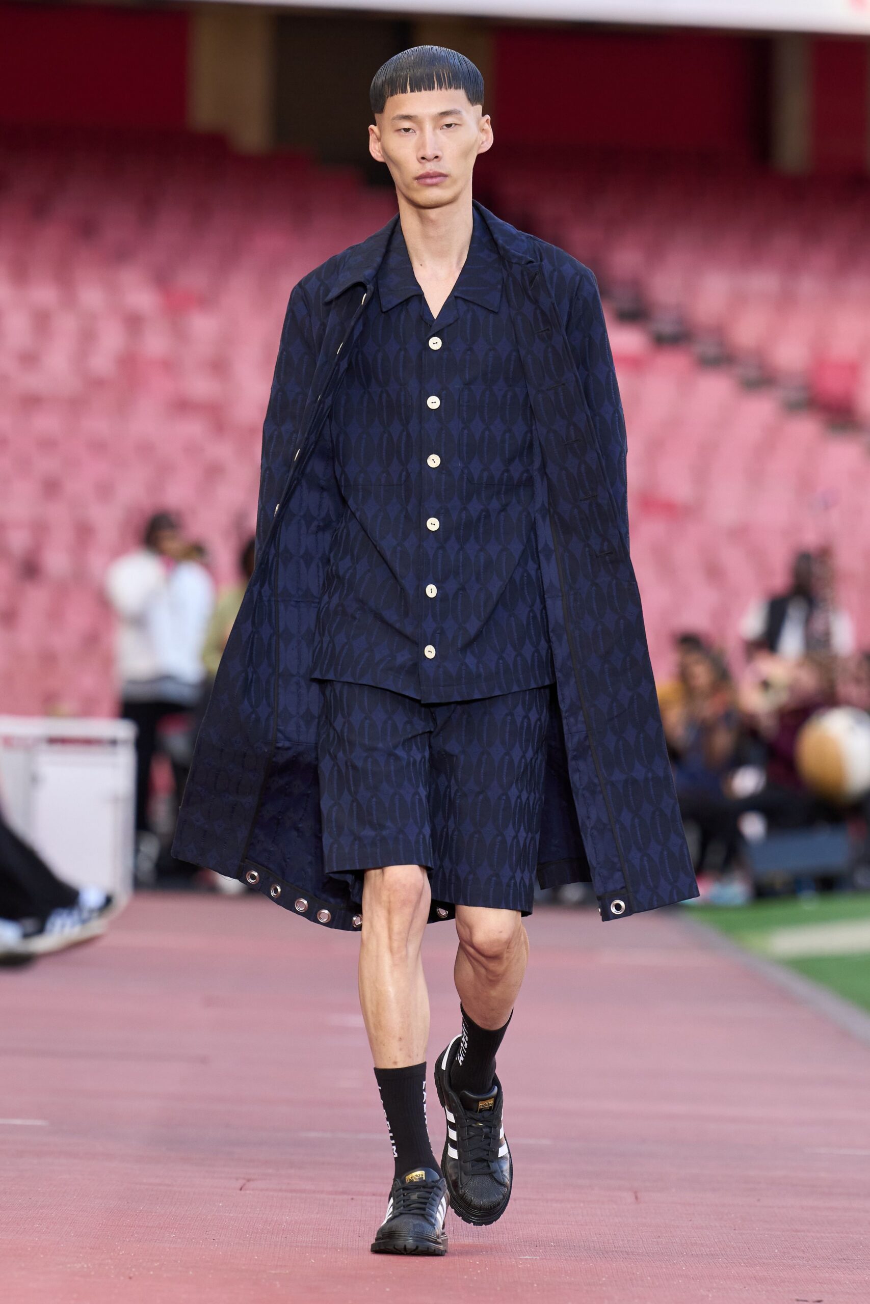 blue cotton long-sleeve collared structured buttoned coat