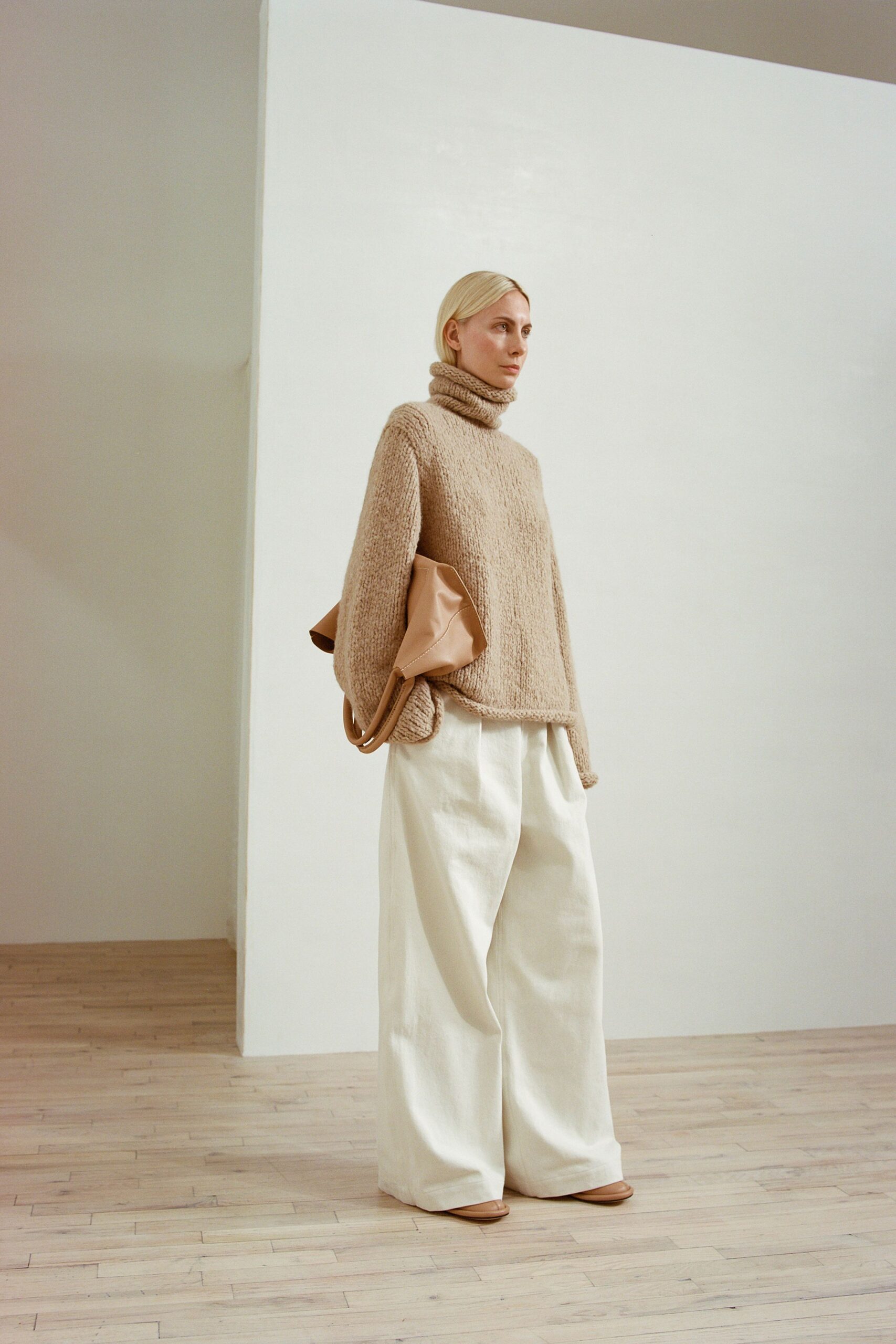 beige wool sweater with wide-leg pants