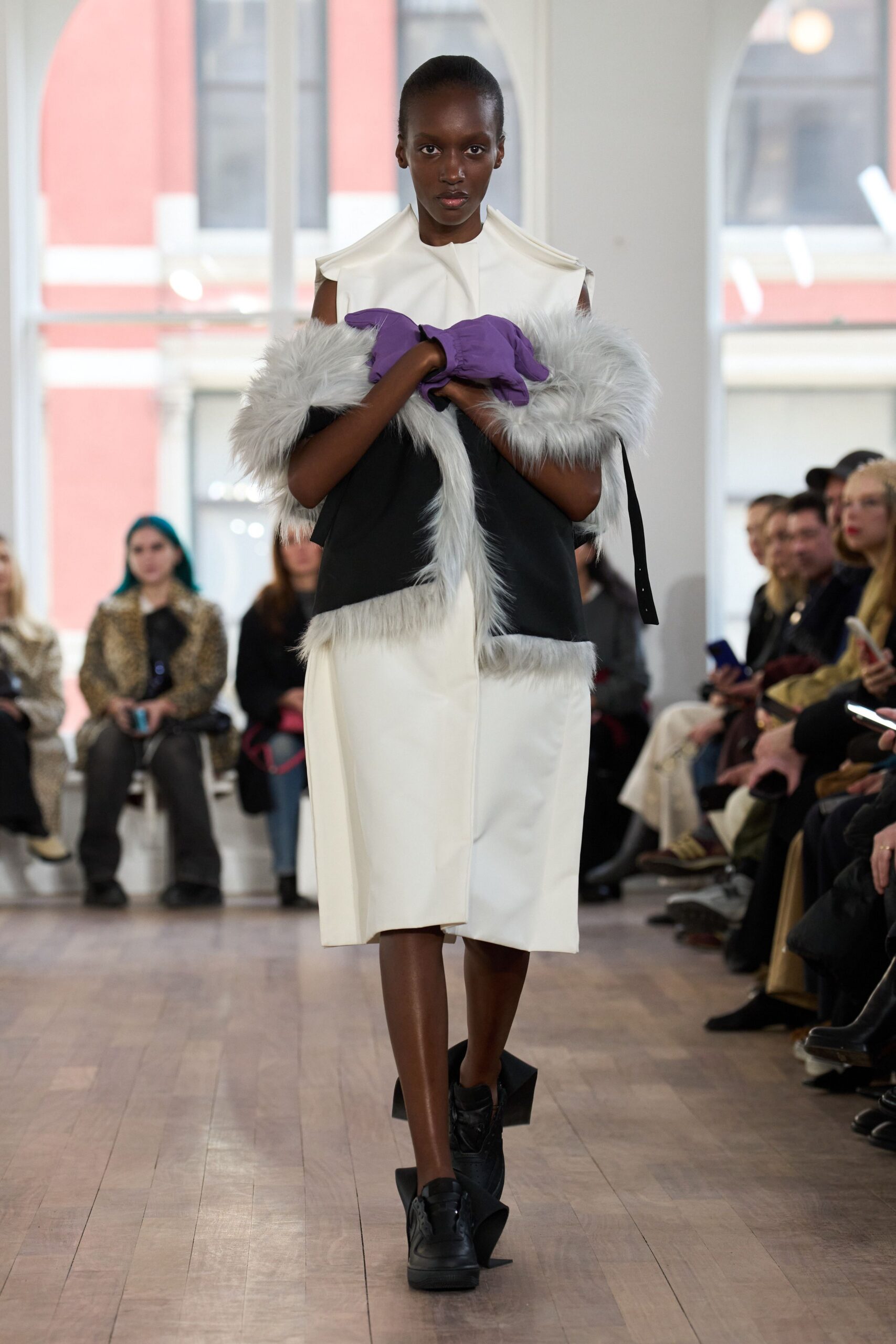 white fitted midi dress with black coat