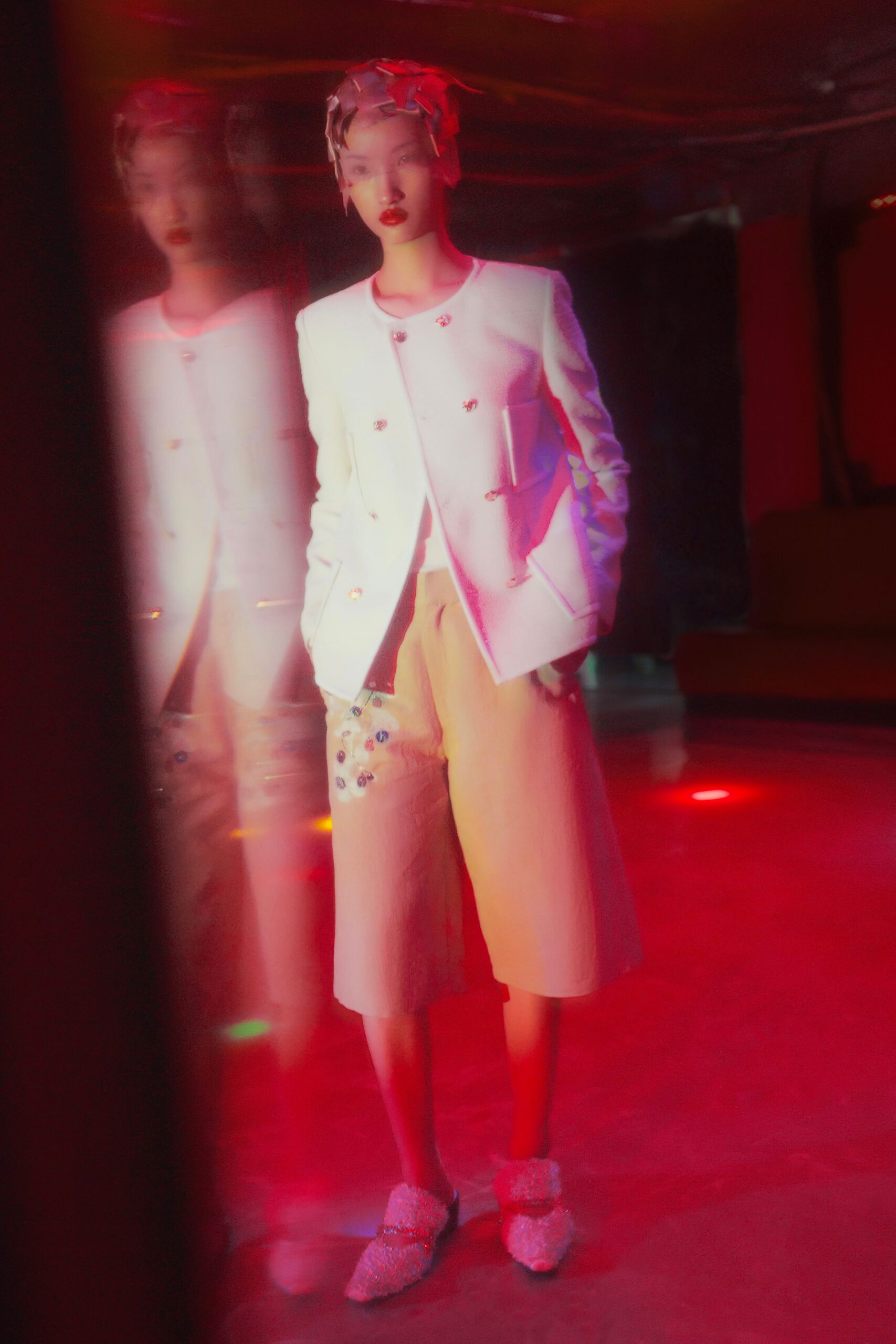 white tailored blazer with beige shorts
