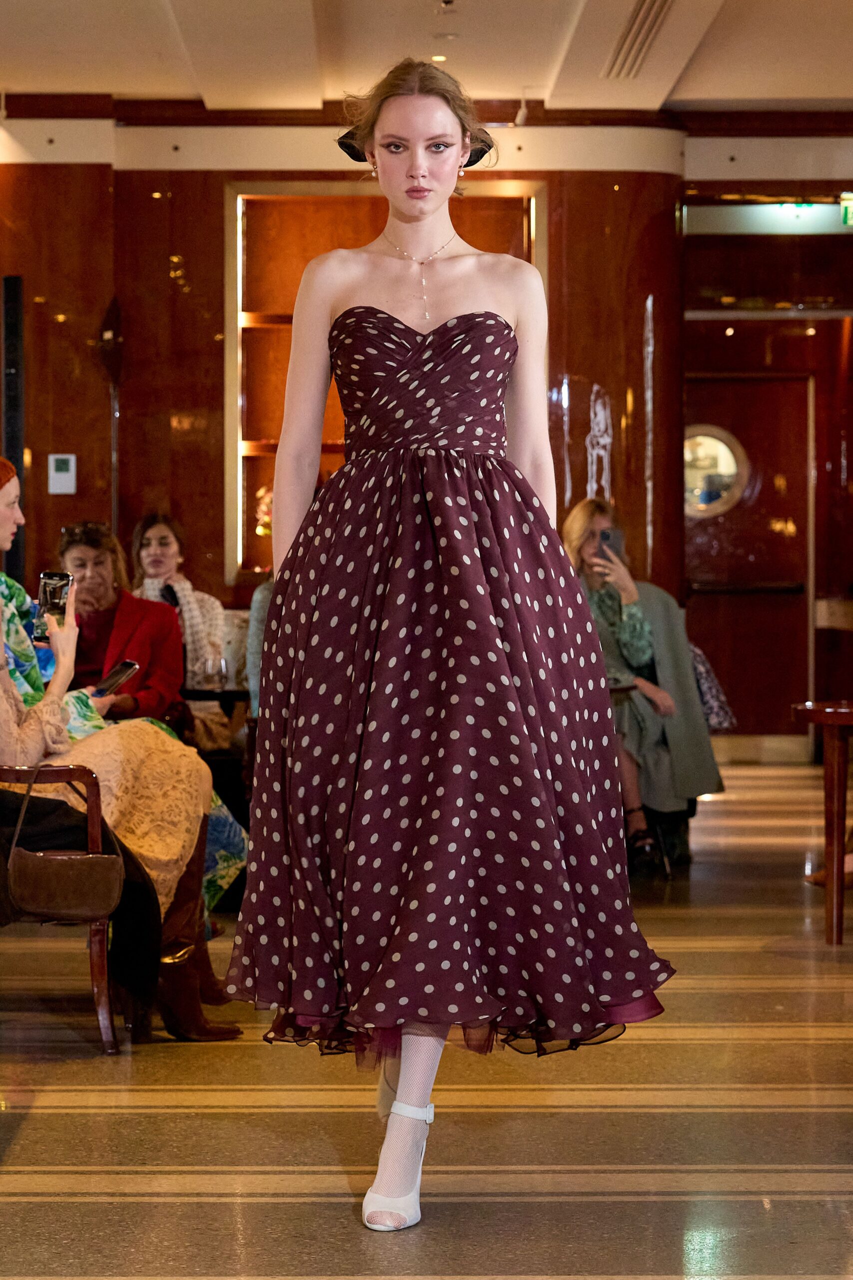 maroon silk strapless fitted polka-dot tiered flowing gown
