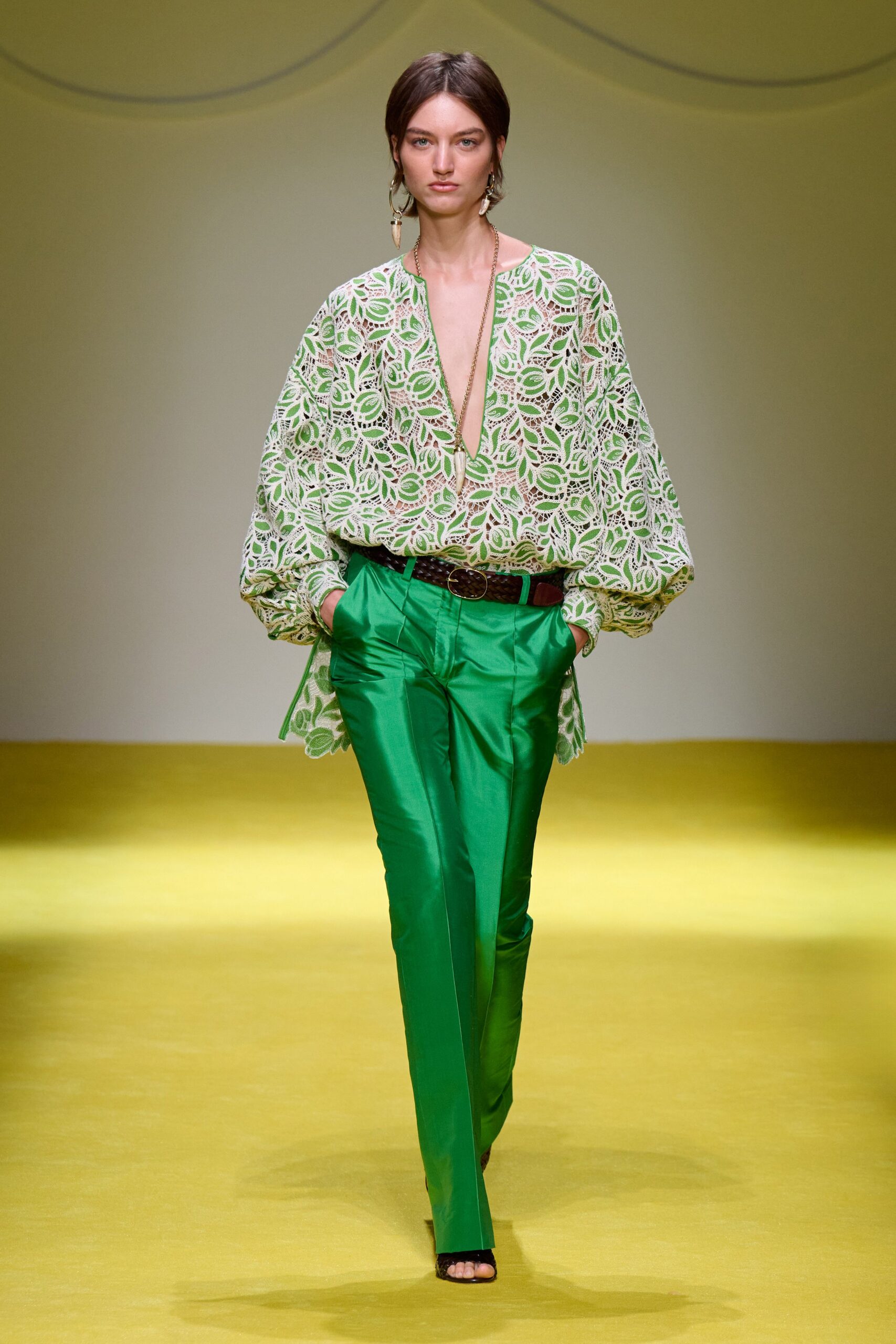 green embroidered blouse with fitted pants