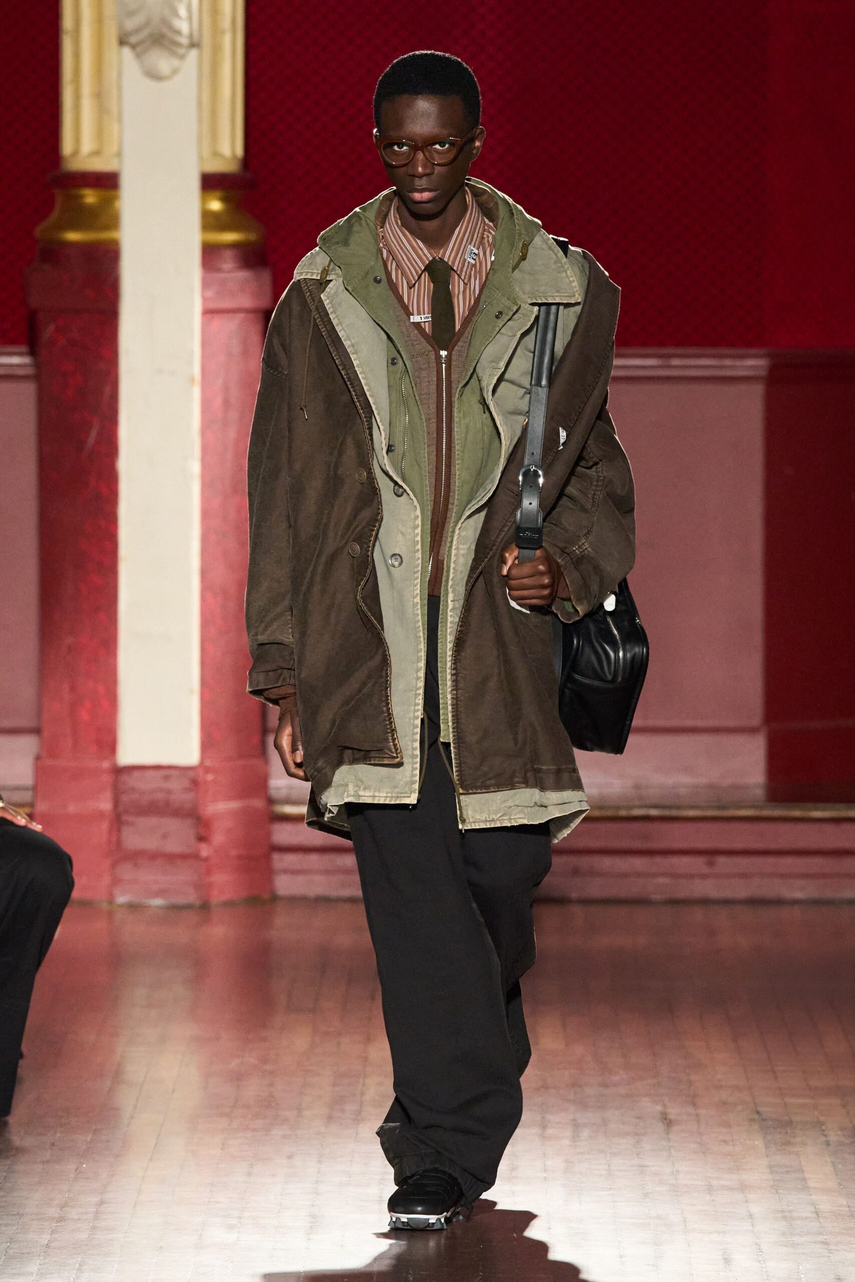 brown coat green jacket black pants