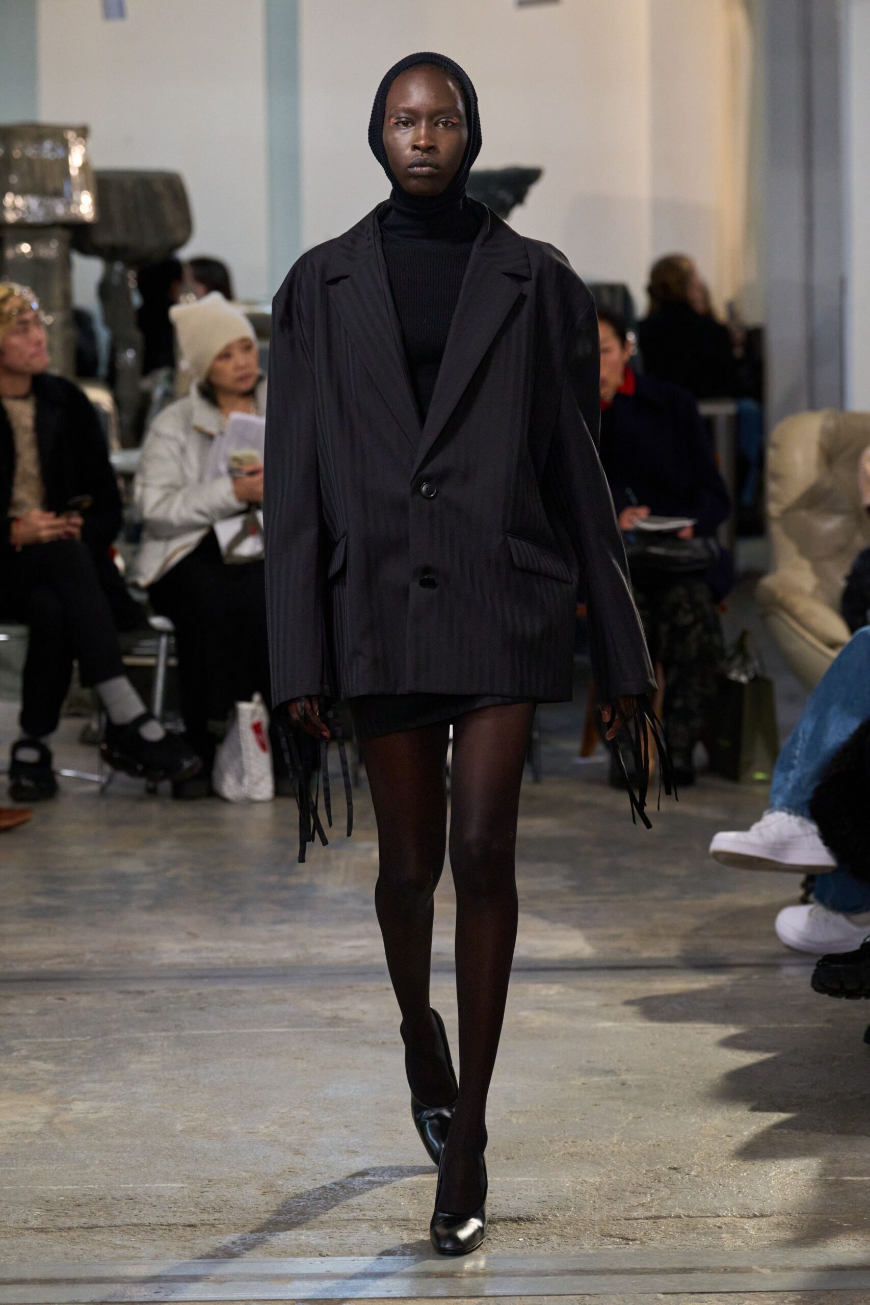 black oversized blazer with mini skirt