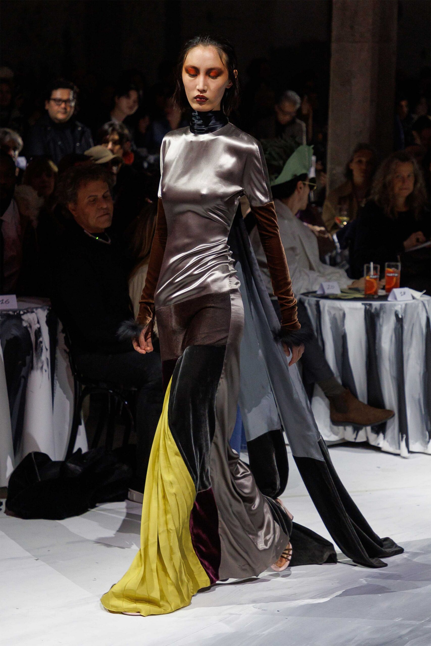 gray and black draped gown