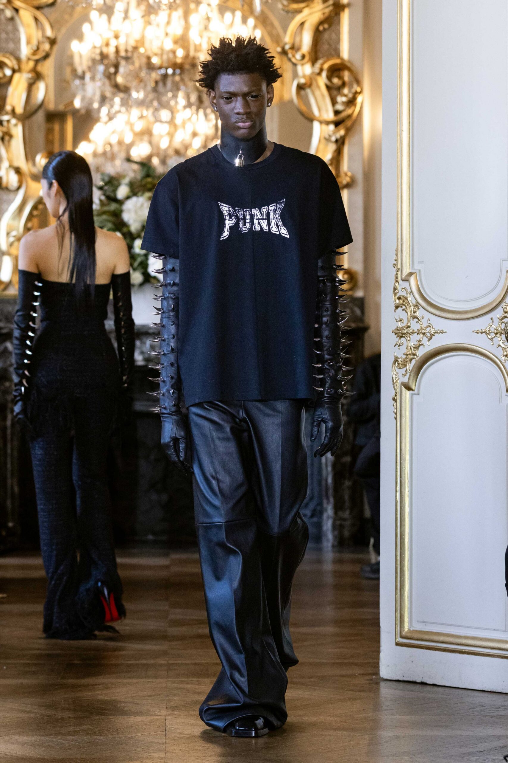 black relaxed t-shirt with leather pants