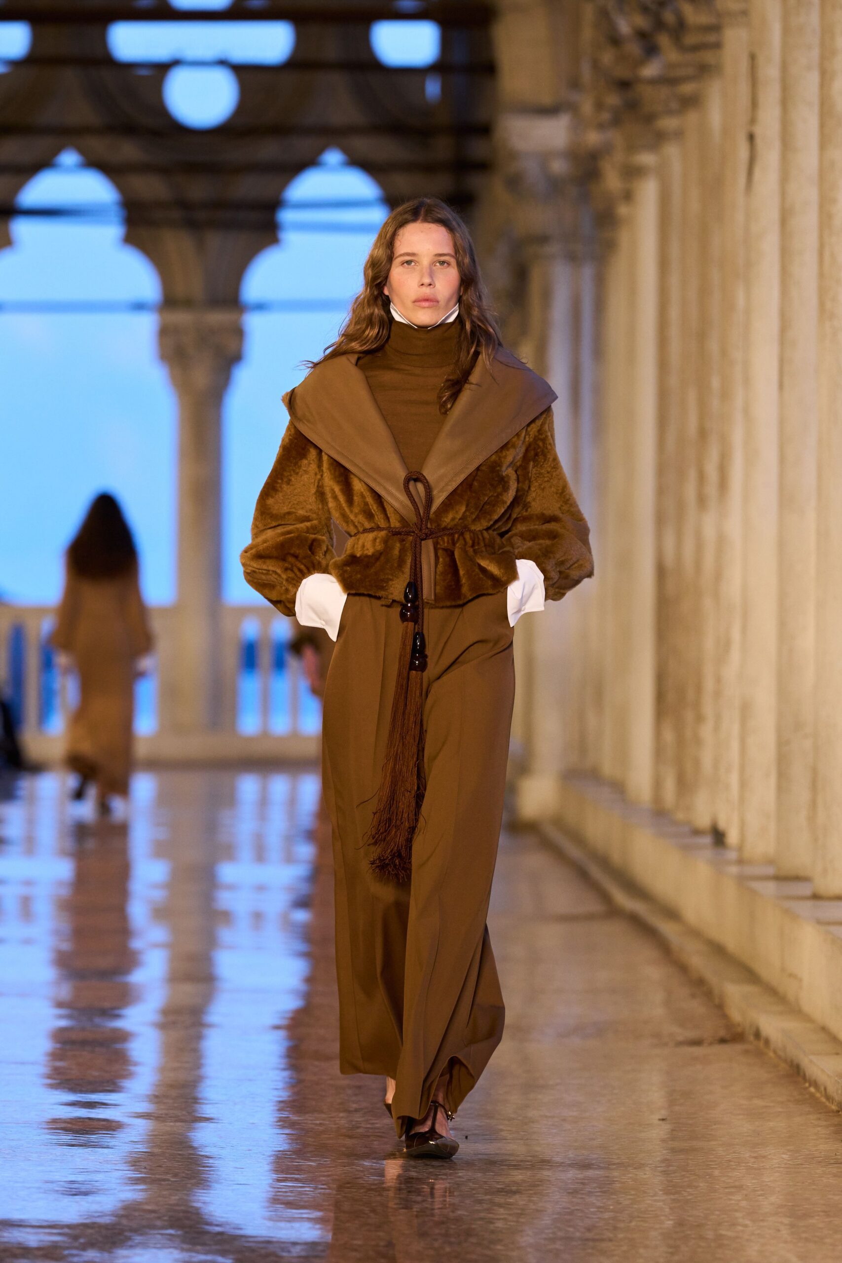 brown fur coat with relaxed pants