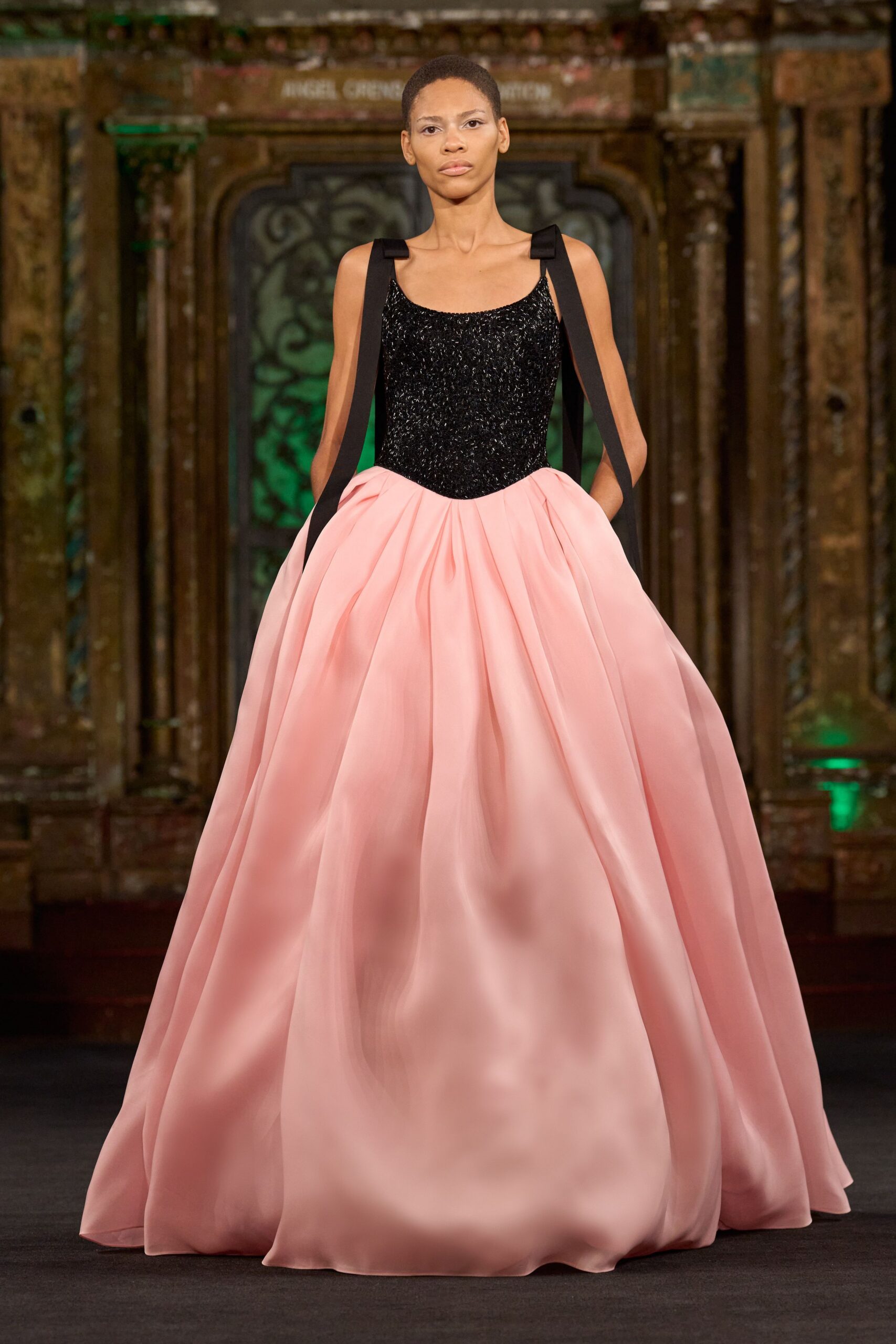 black and pink pleated gown