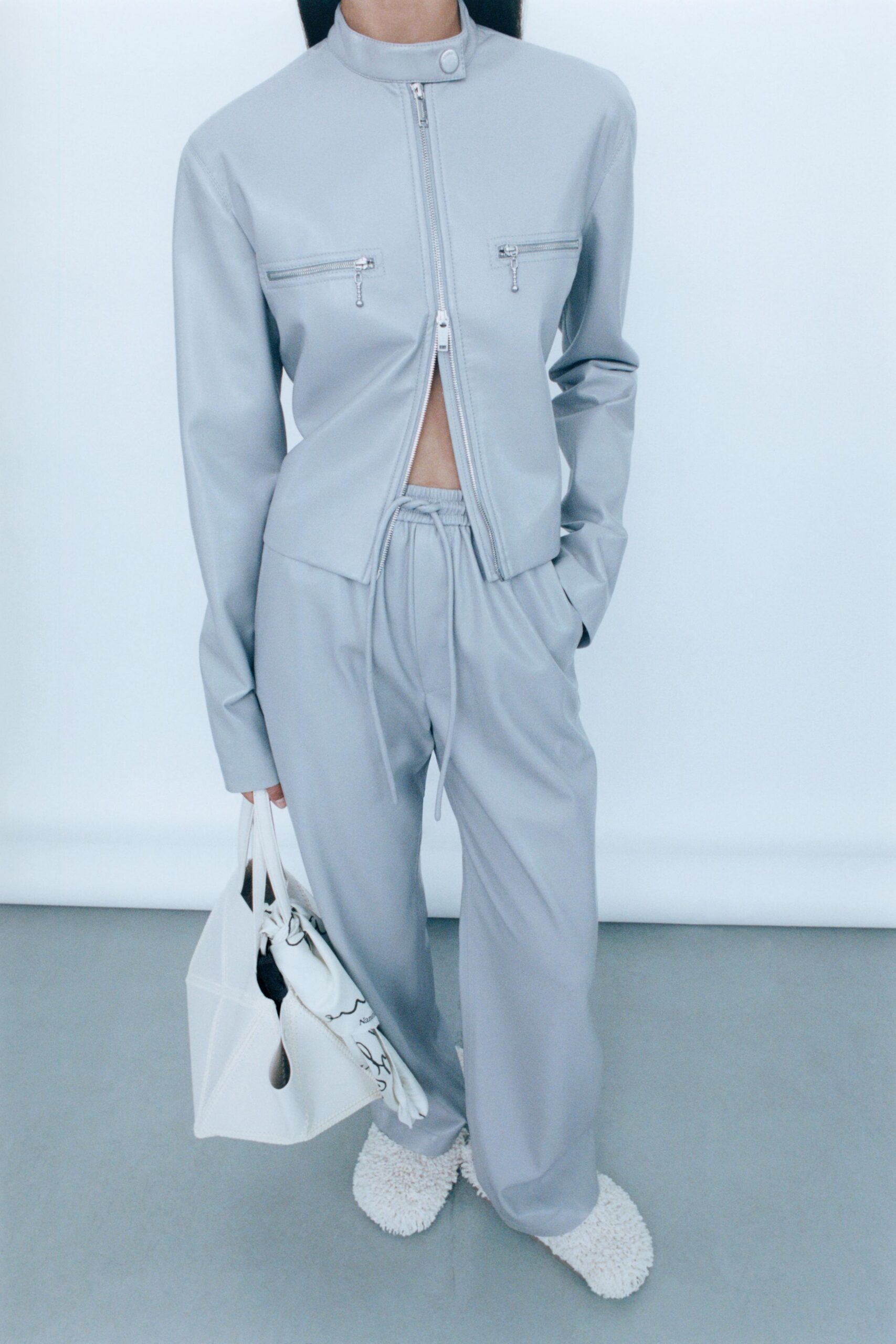 gray leather long-sleeve collared fitted zippered jacket