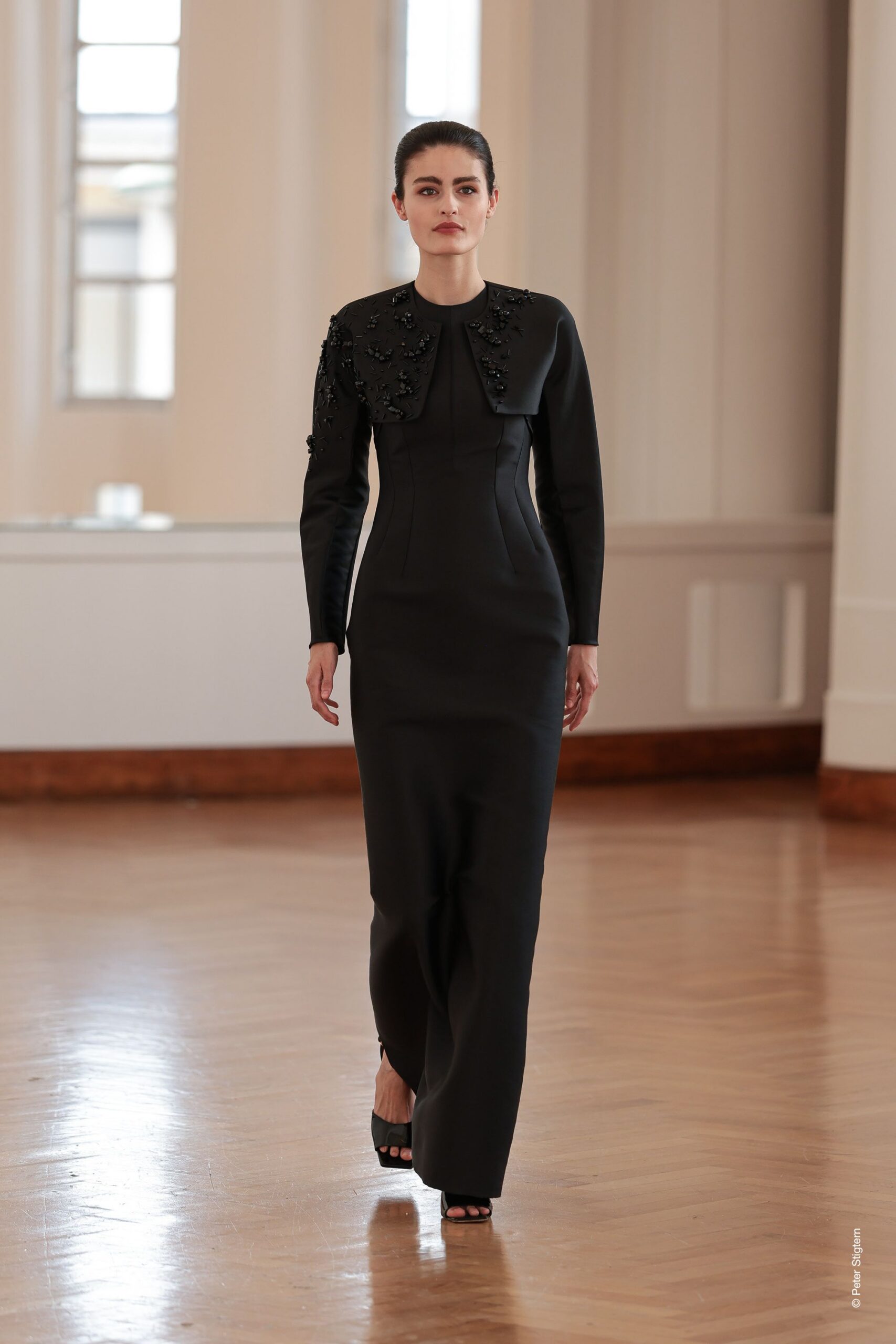 black silk fitted gown with embroidered details