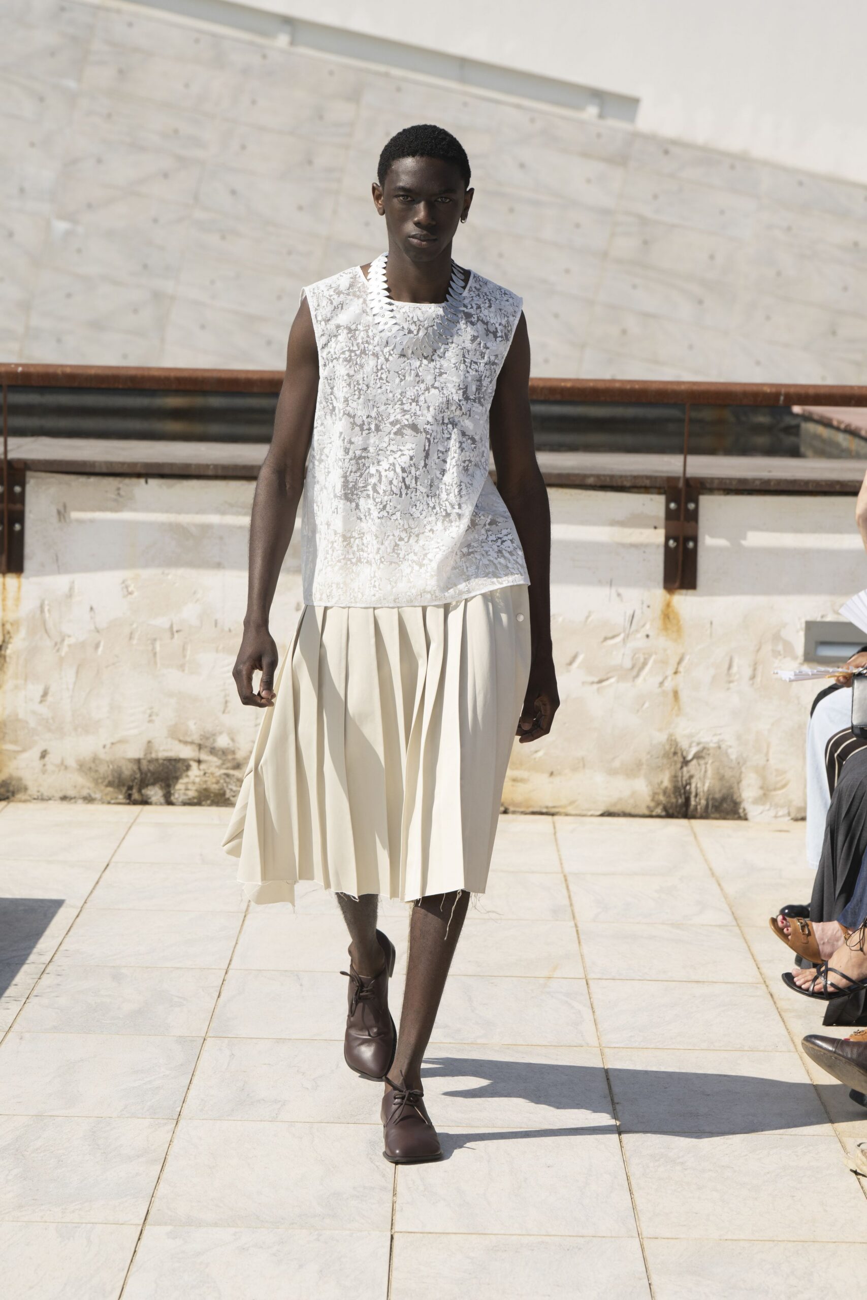 white embroidered top beige pleated skirt