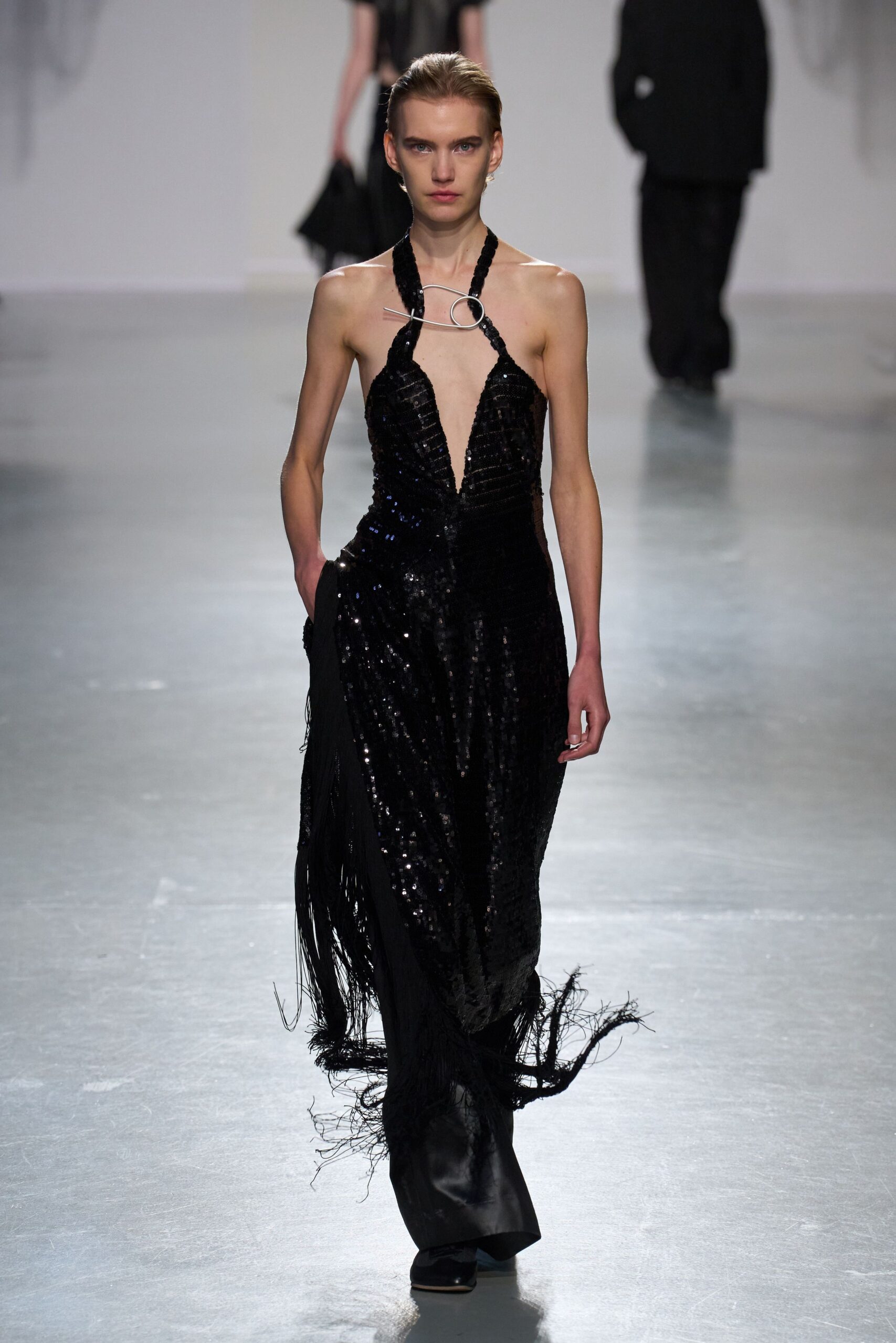 black sequined sleeveless gown