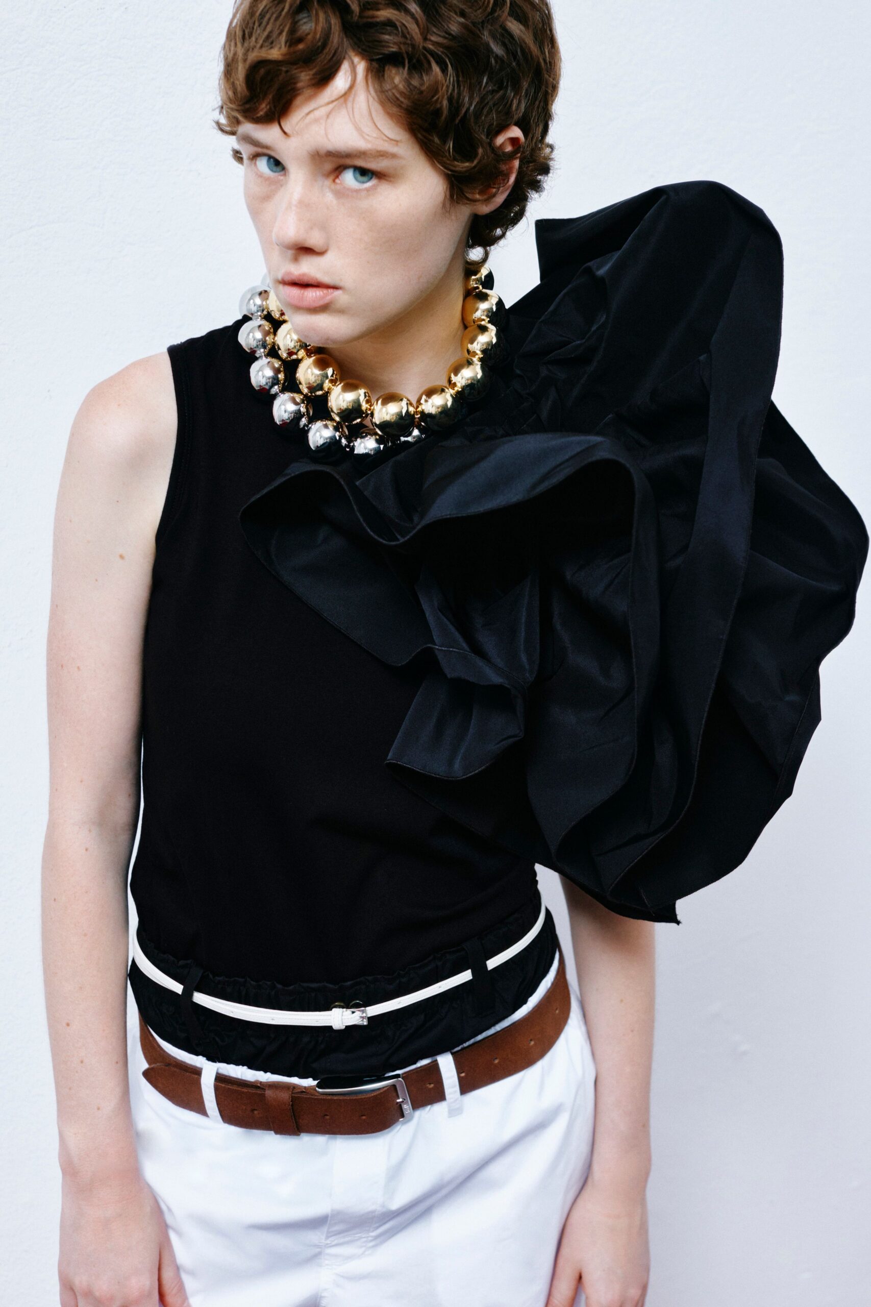 black fitted top with draping