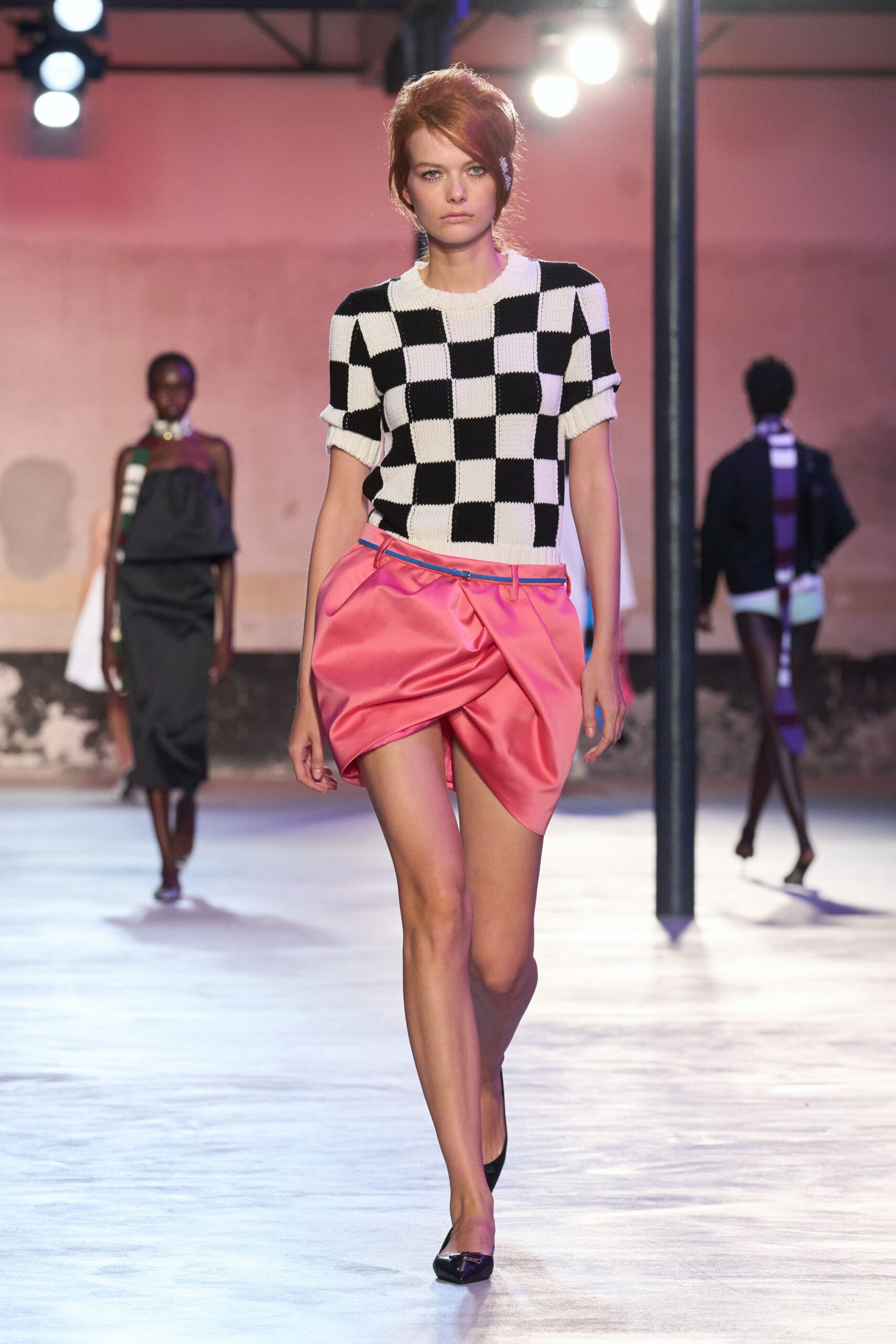 black and white checkered top with pink skirt