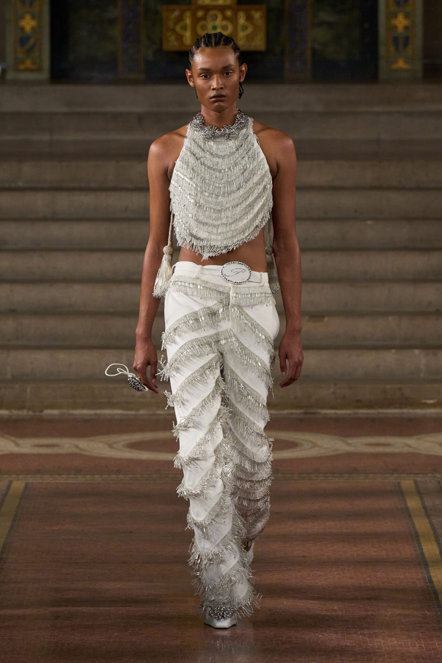 white fringed top and pants