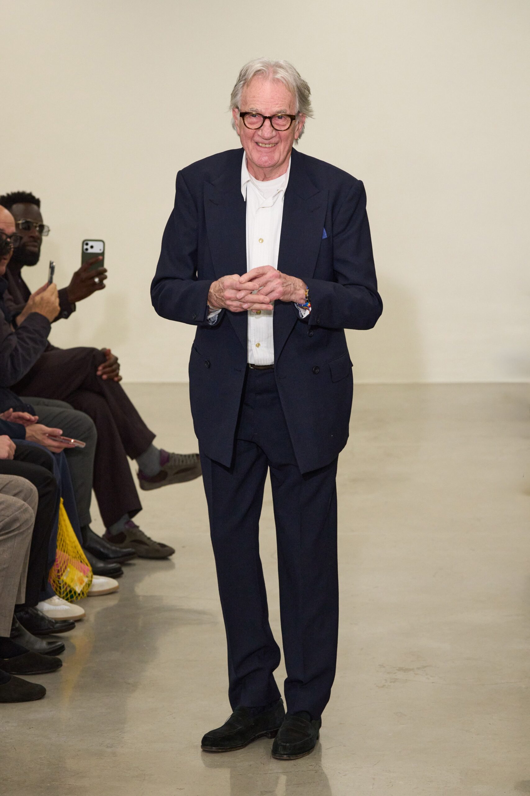 black tailored suit with white shirt