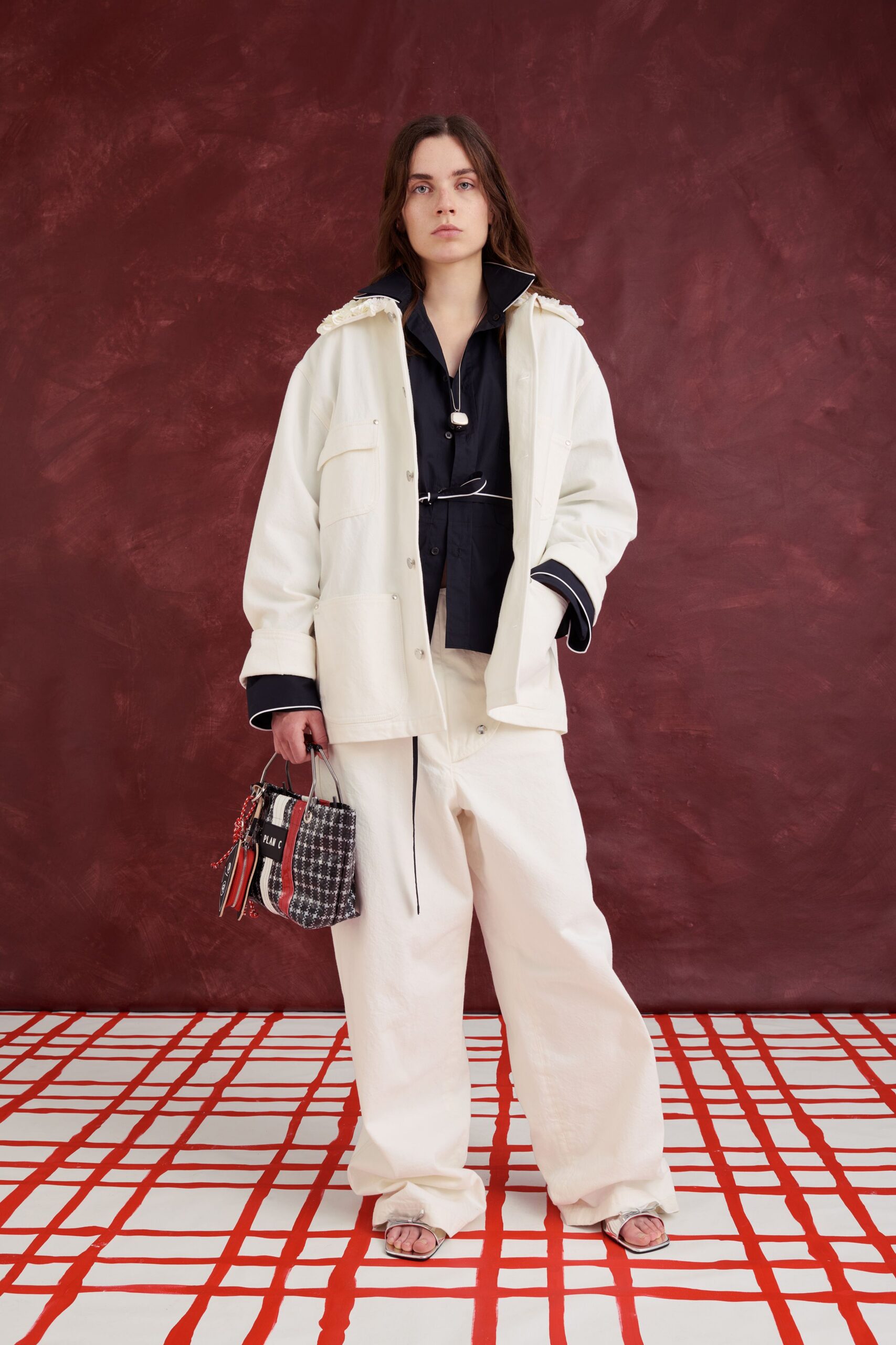 white relaxed jacket with black top