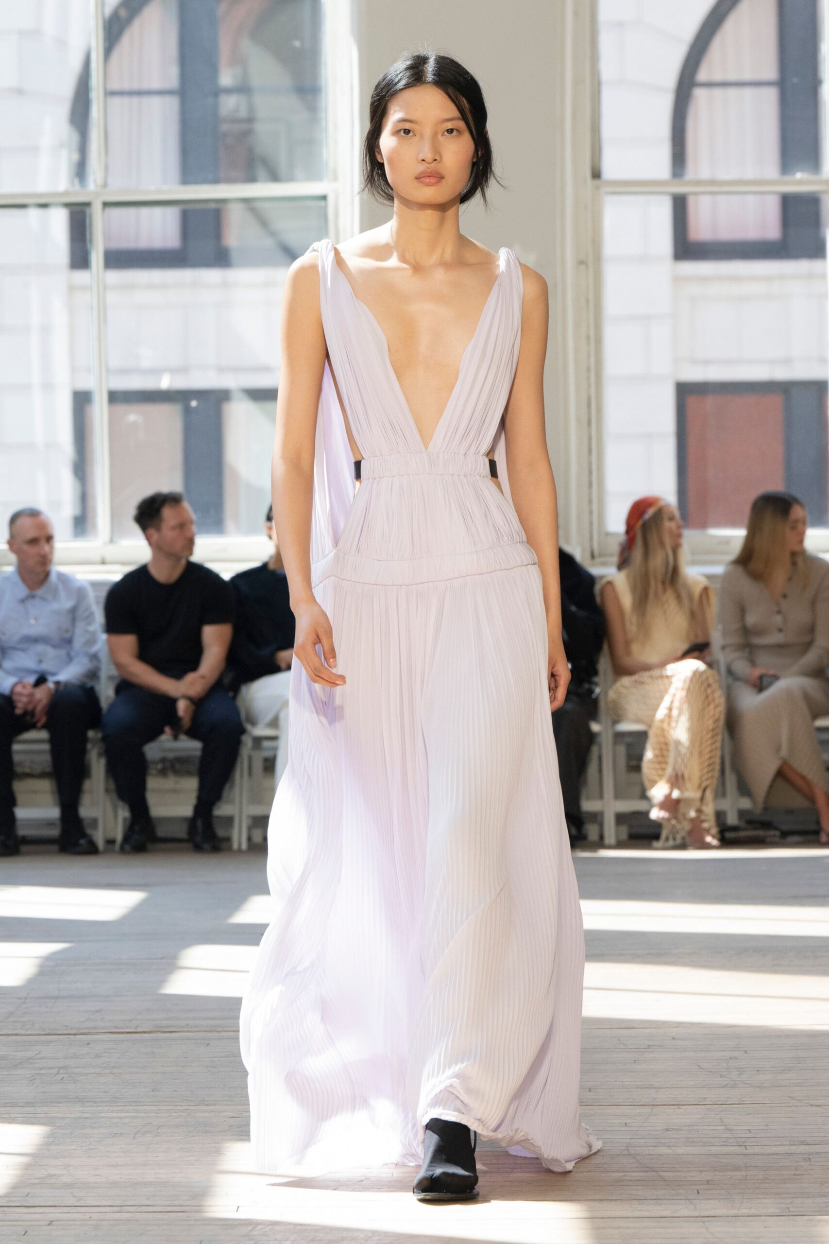 lavender pleated gown with black boots