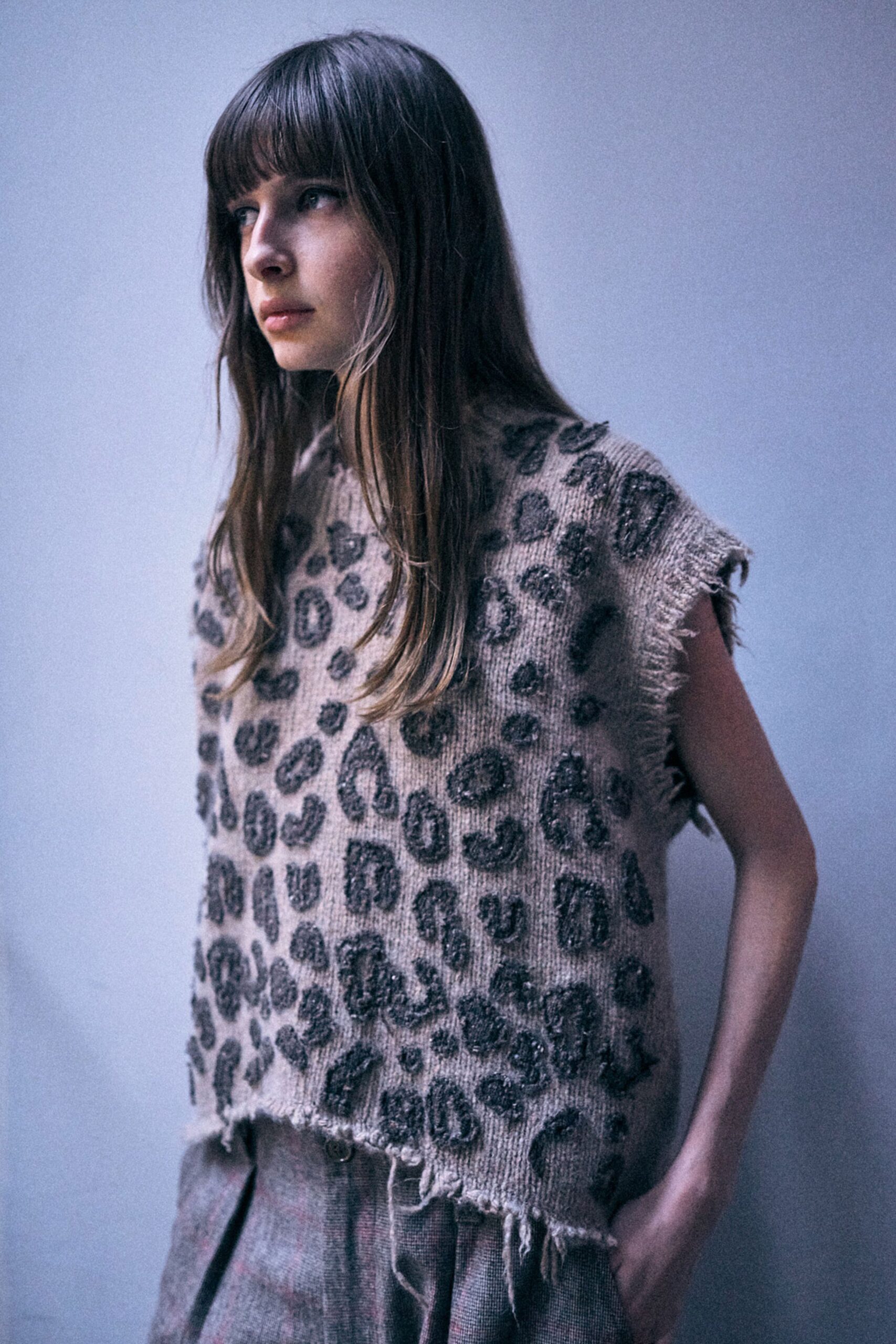 beige wool sleeveless relaxed animal-print fringed top