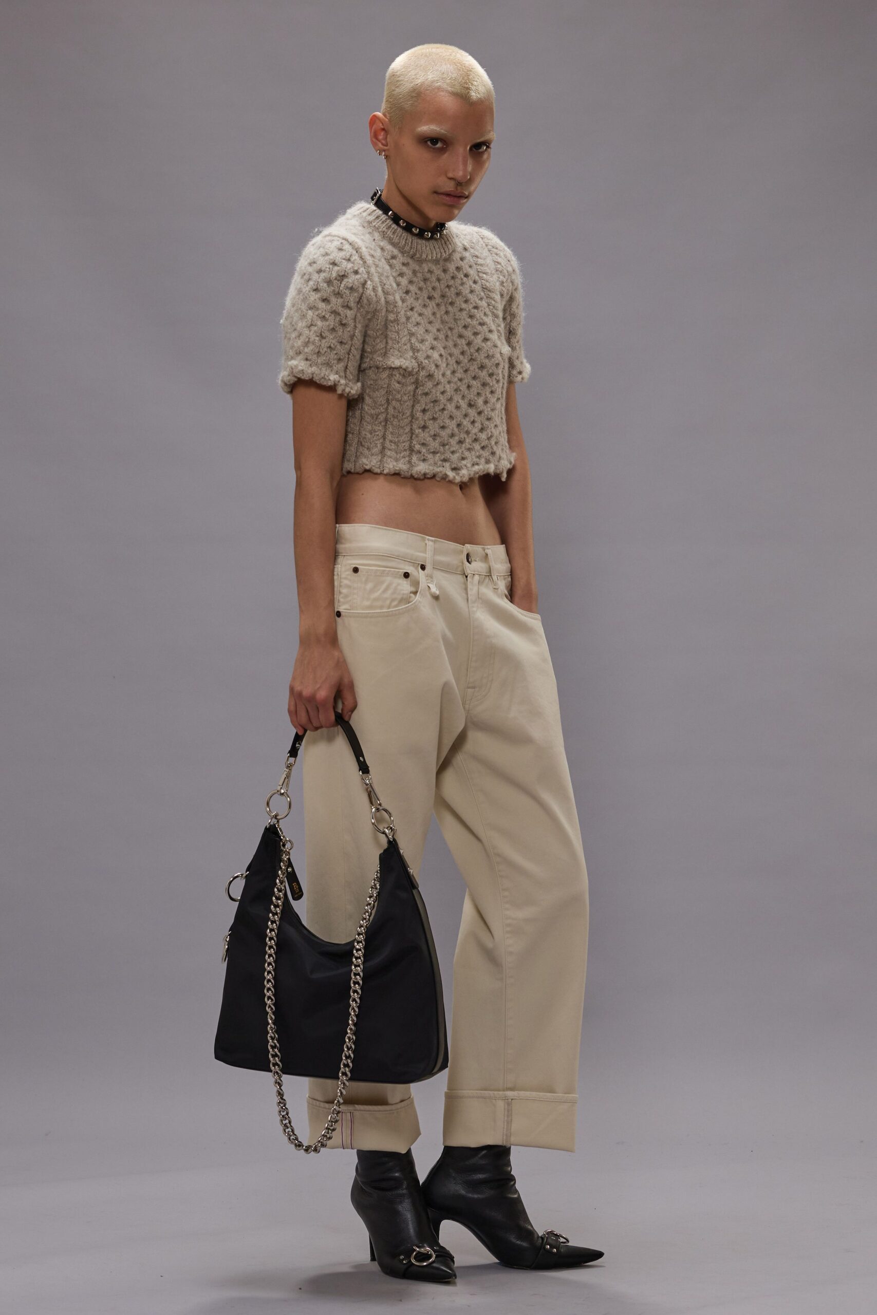 beige cropped top with white relaxed pants