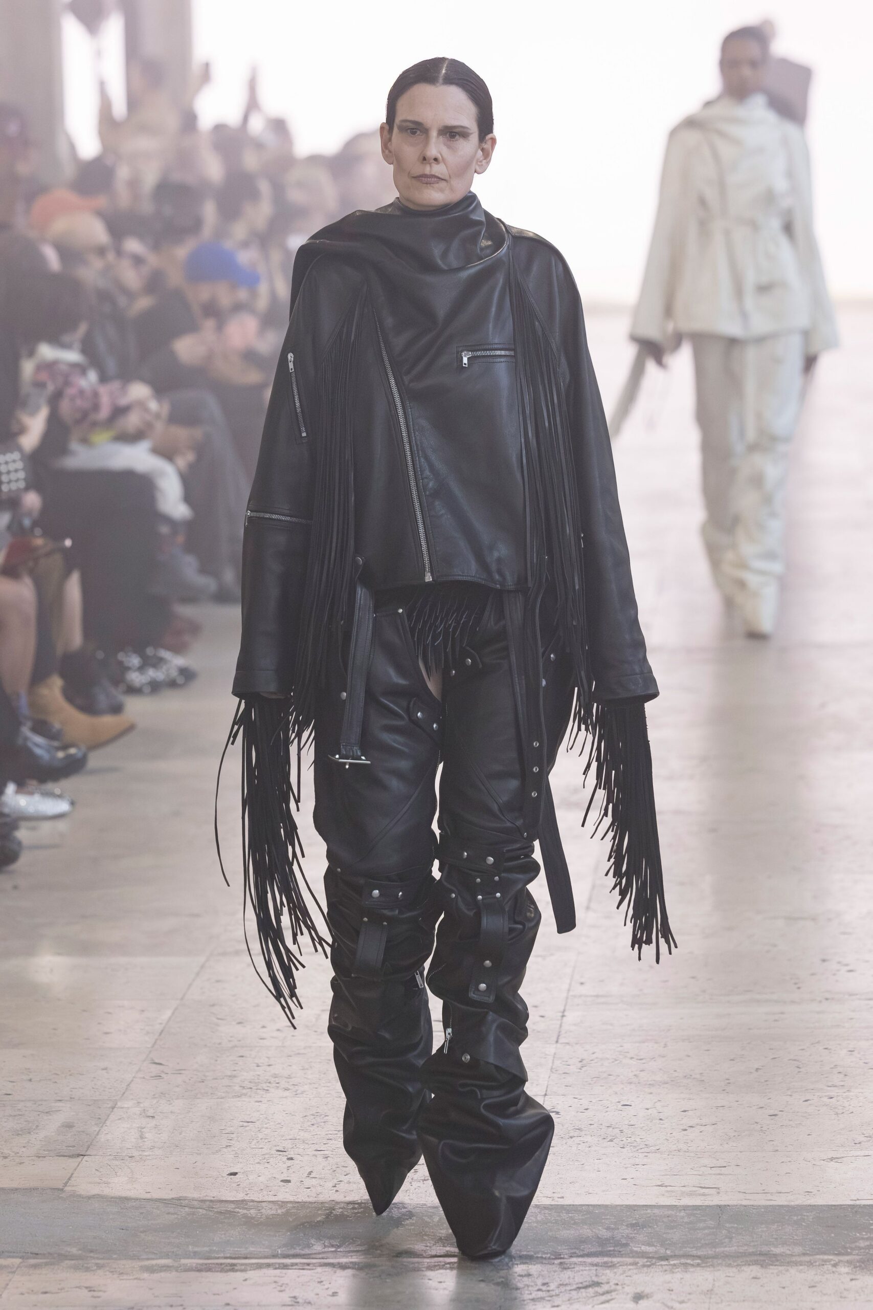 black leather oversized jacket and fitted pants