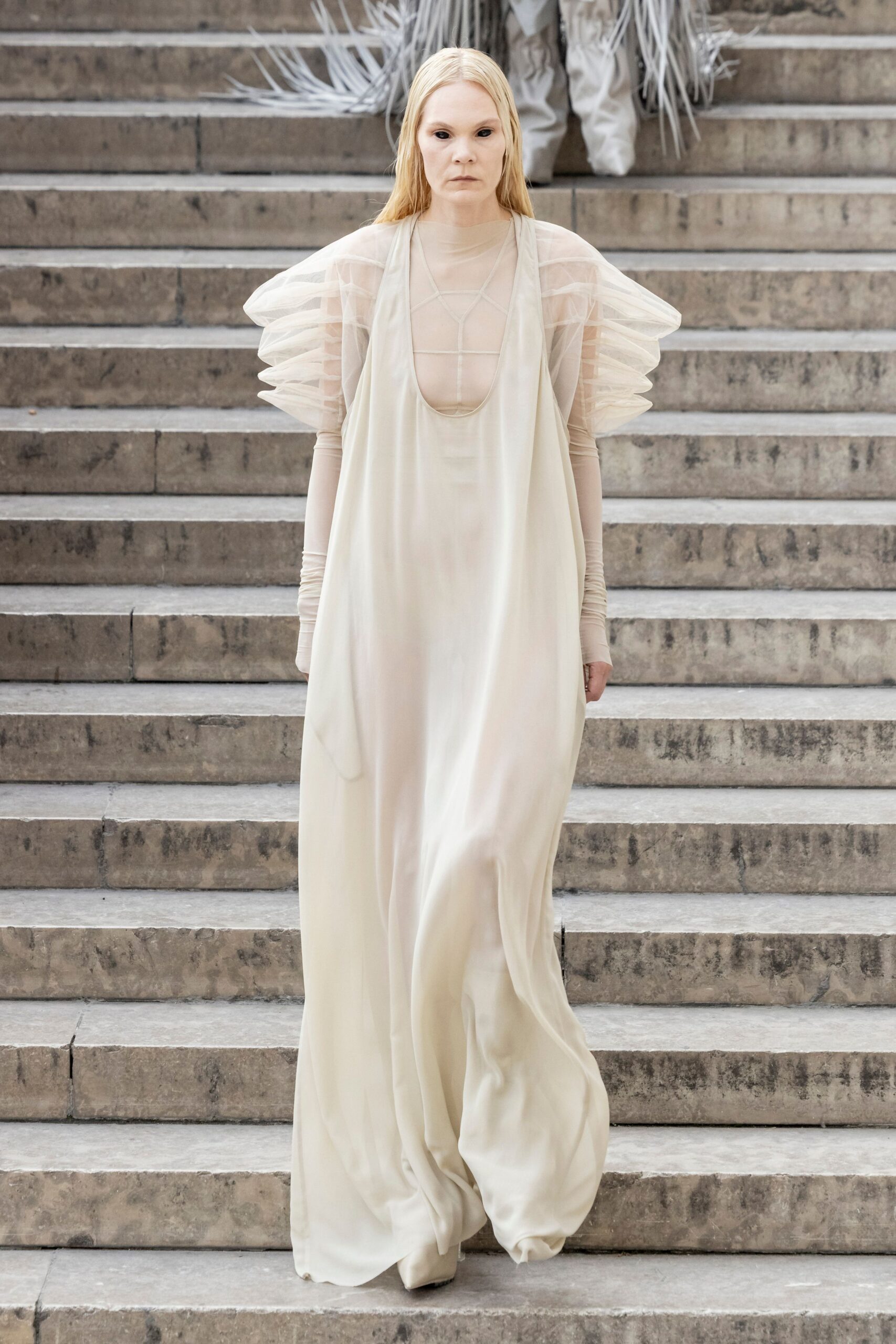 white sheer flowing gown