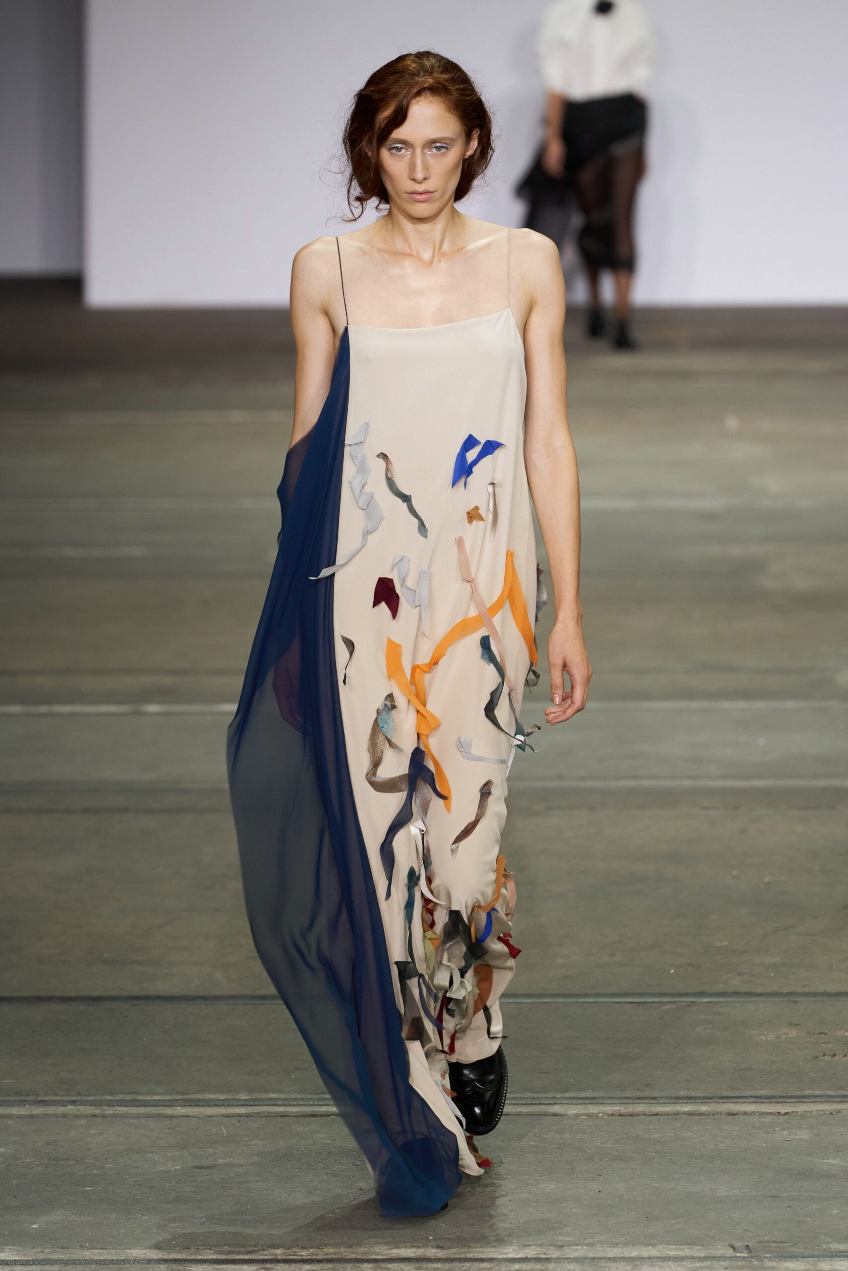 beige flowing maxi dress with blue details