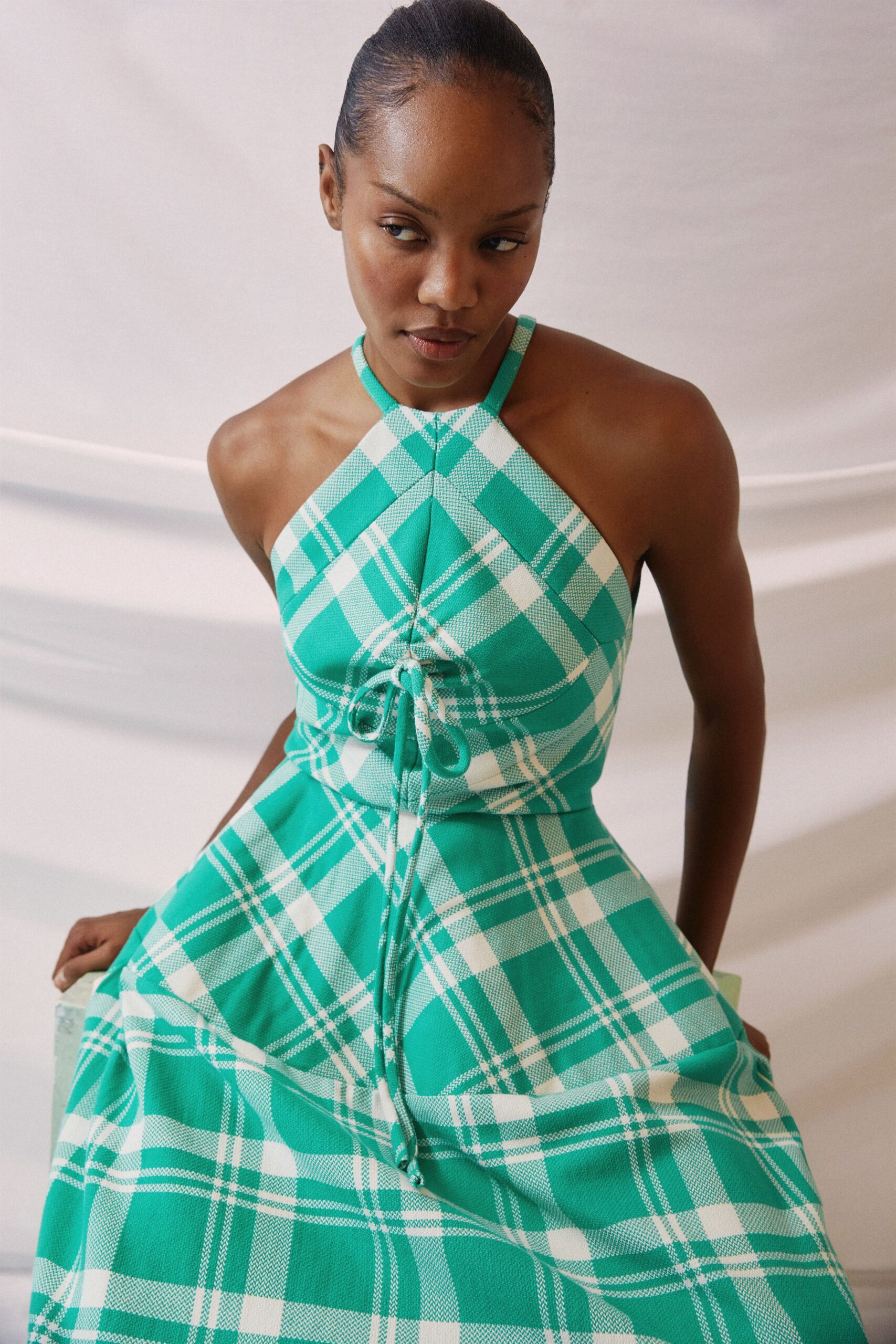 green and white checked midi dress
