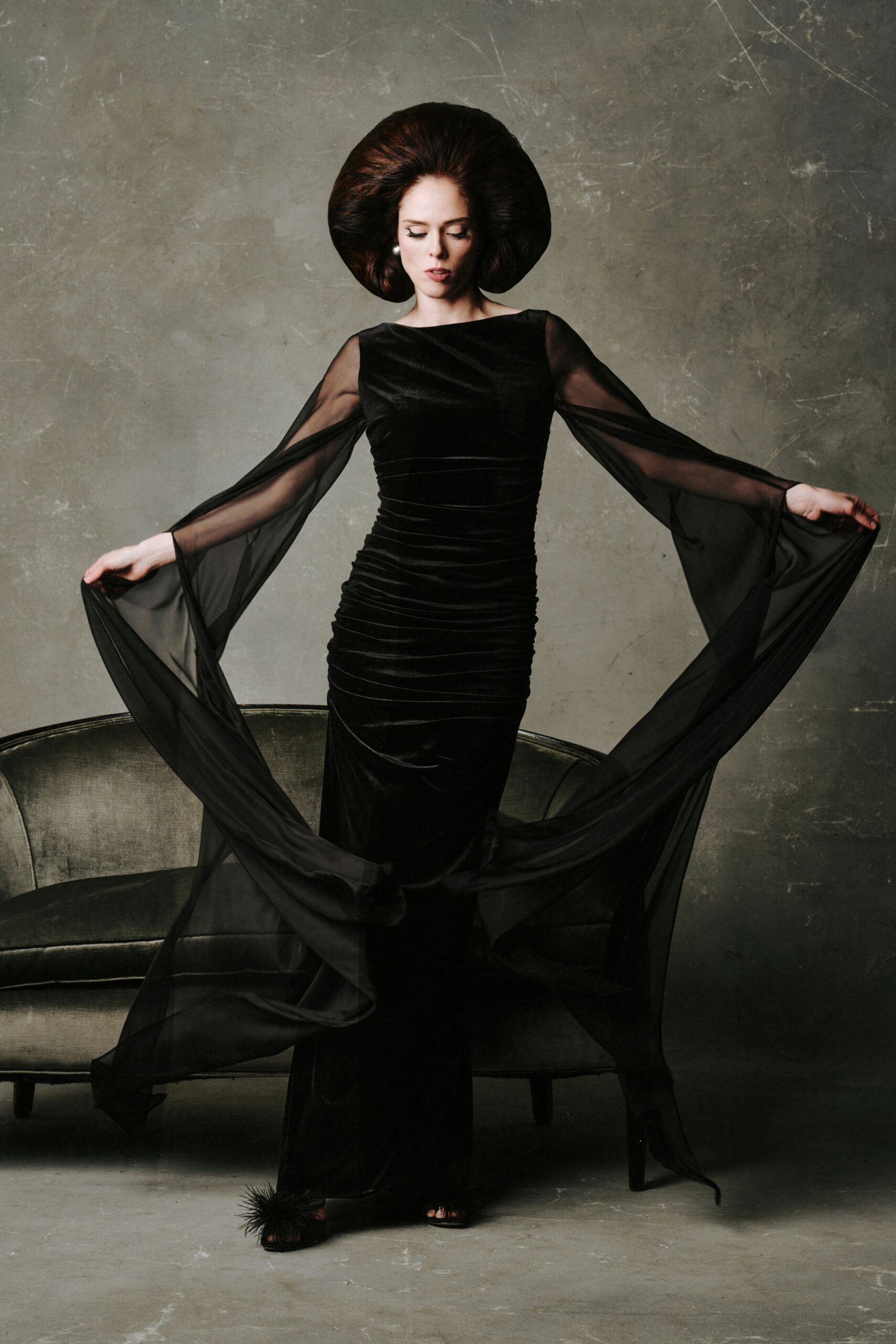 black velvet gown with flowing sleeves