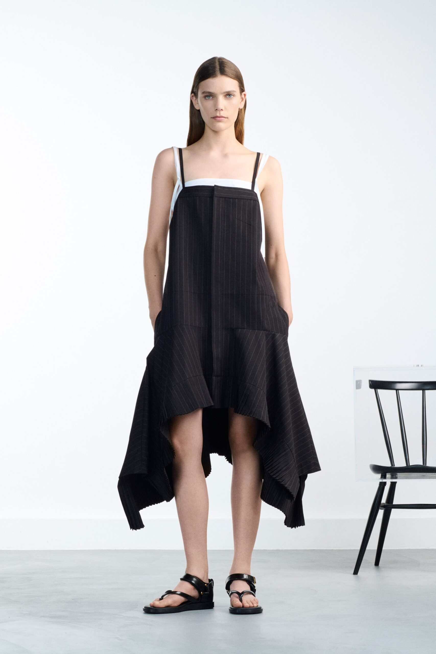 black cotton sleeveless v-neck fitted pleated midi dress