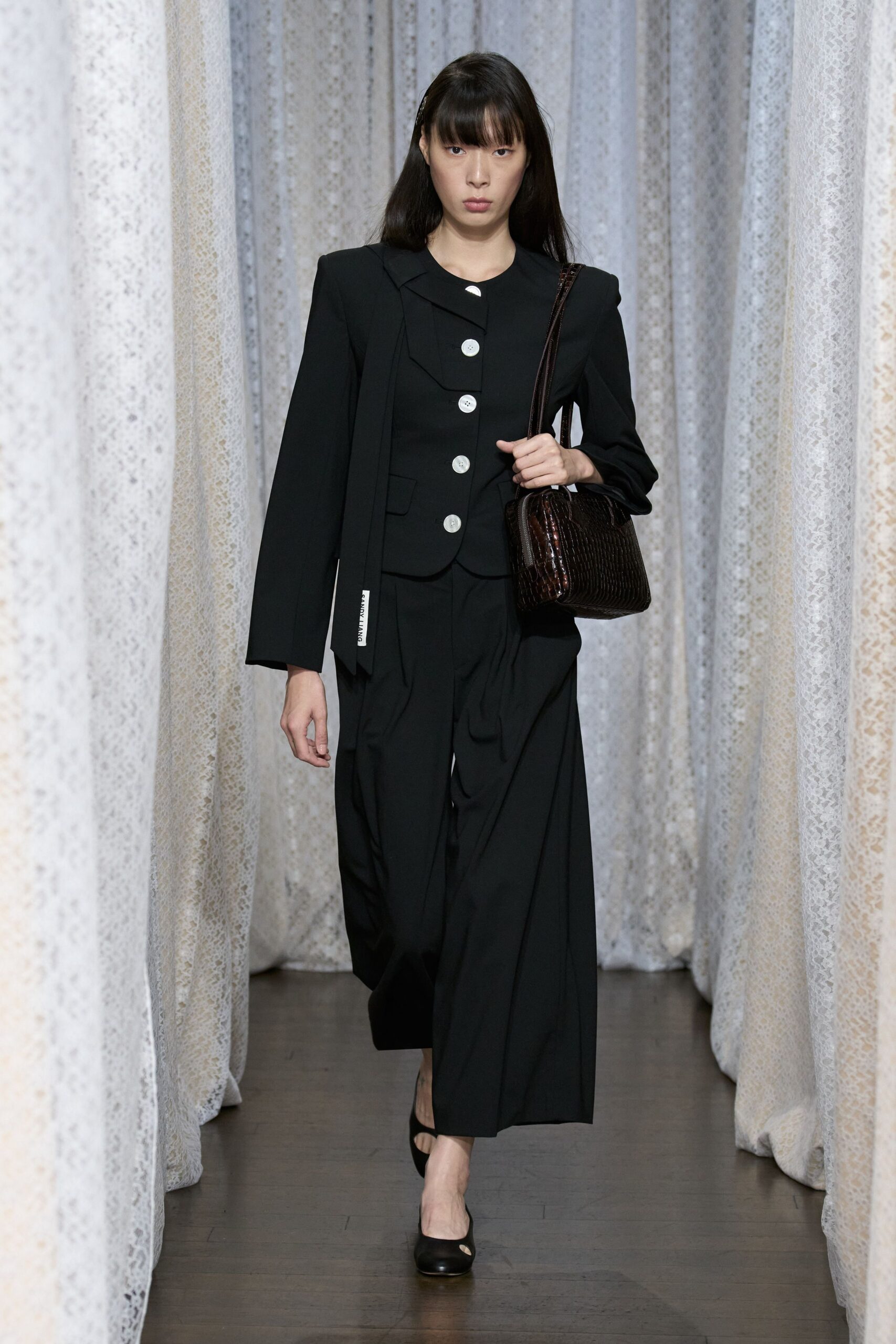 black blazer and relaxed pants