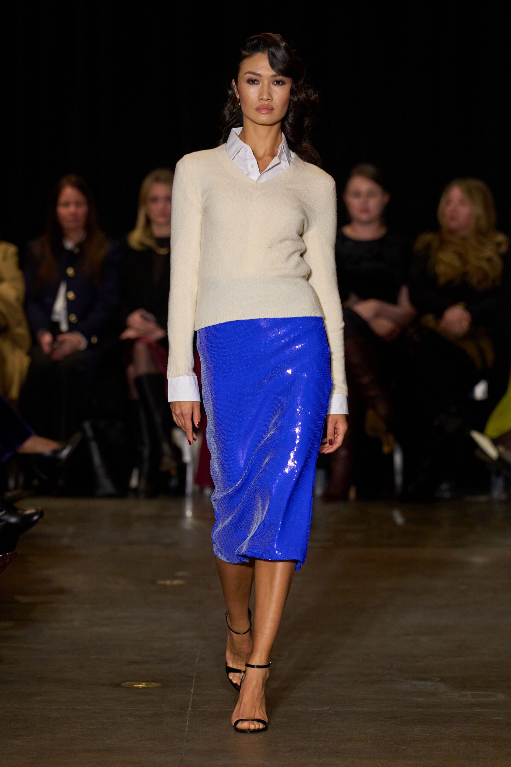 beige sweater blue sequined skirt