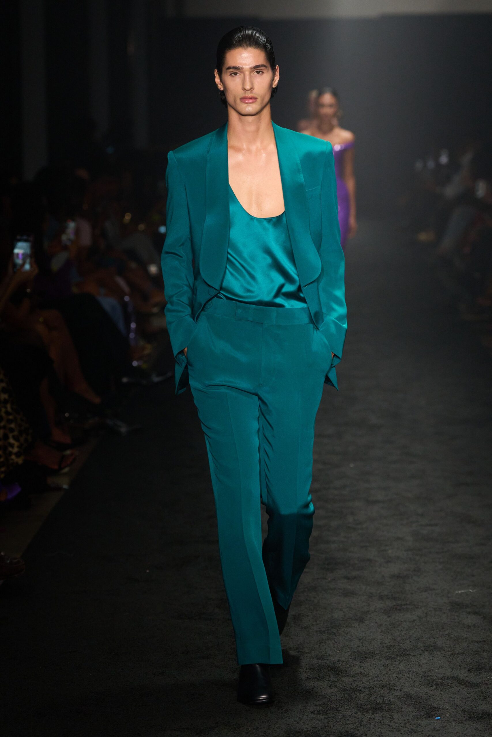 teal tailored suit with black shoes
