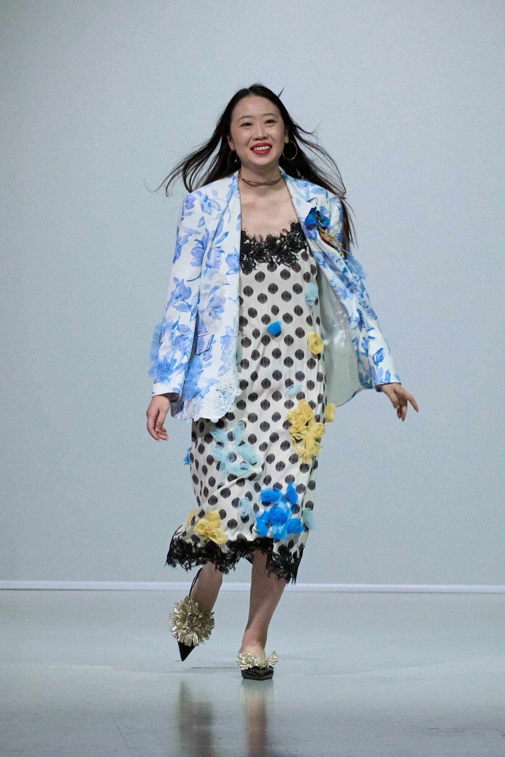 floral blazer over polka-dot dress