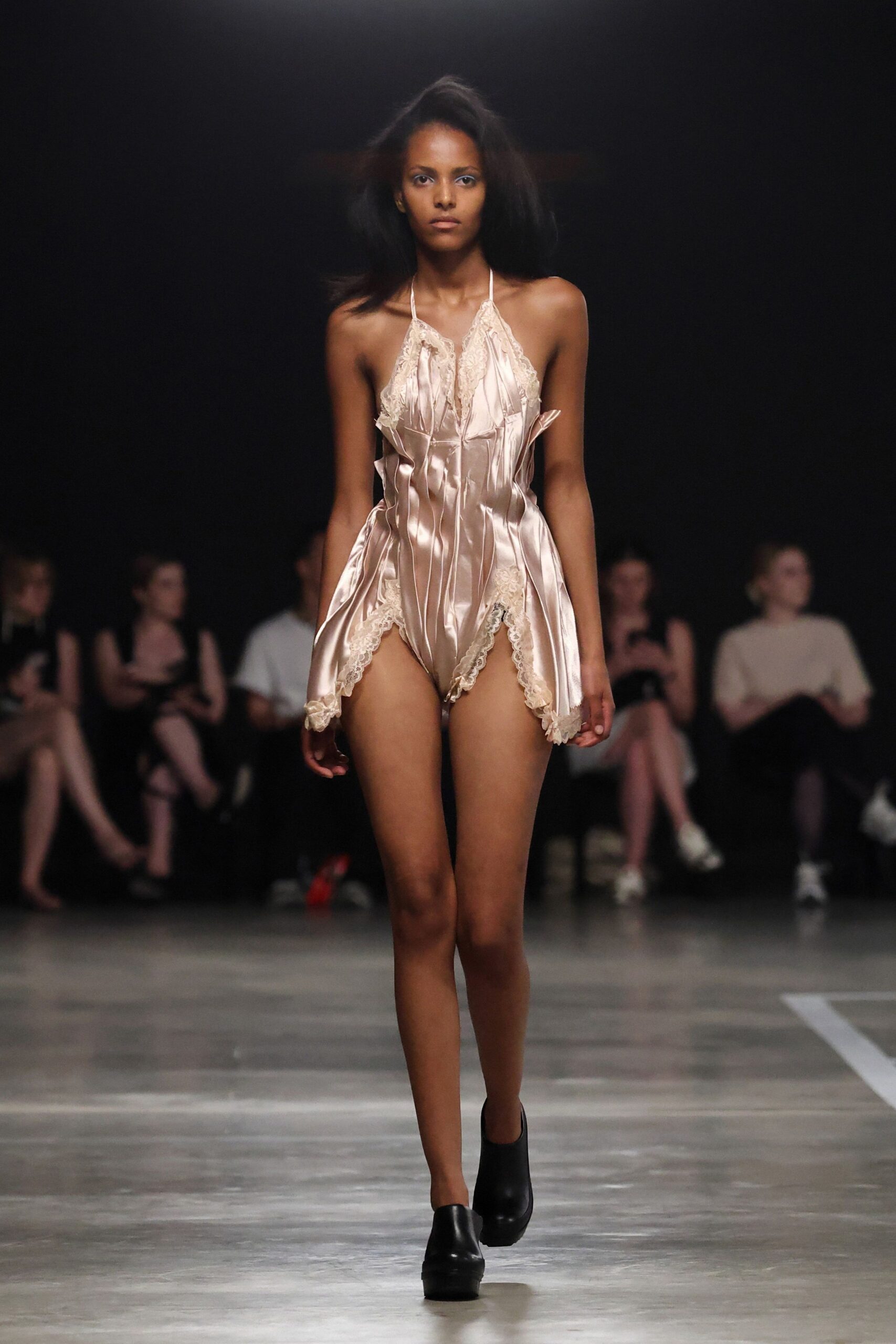 pink silk sleeveless v-neck fitted ruffled layered romper