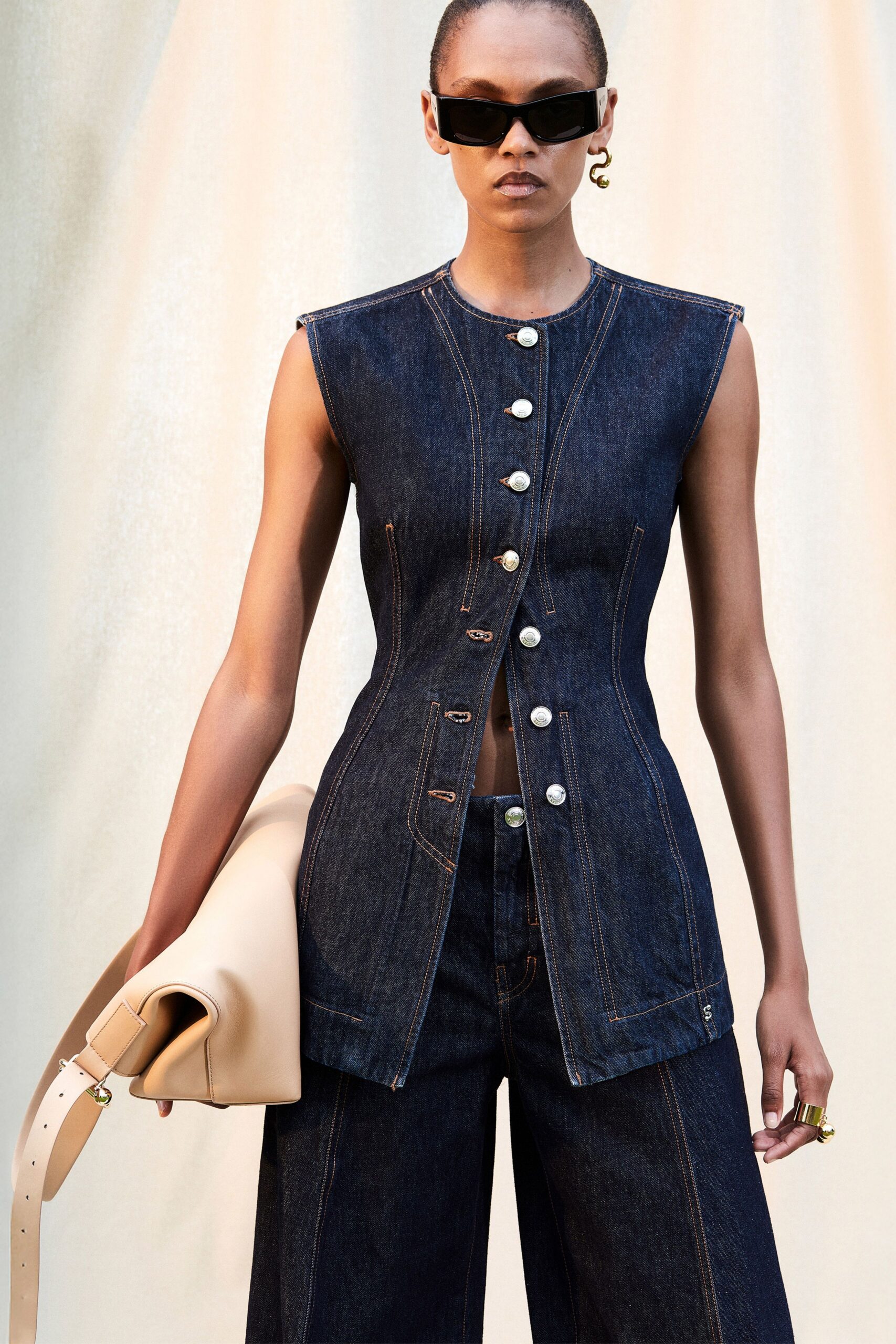 blue denim sleeveless collared fitted buttoned top